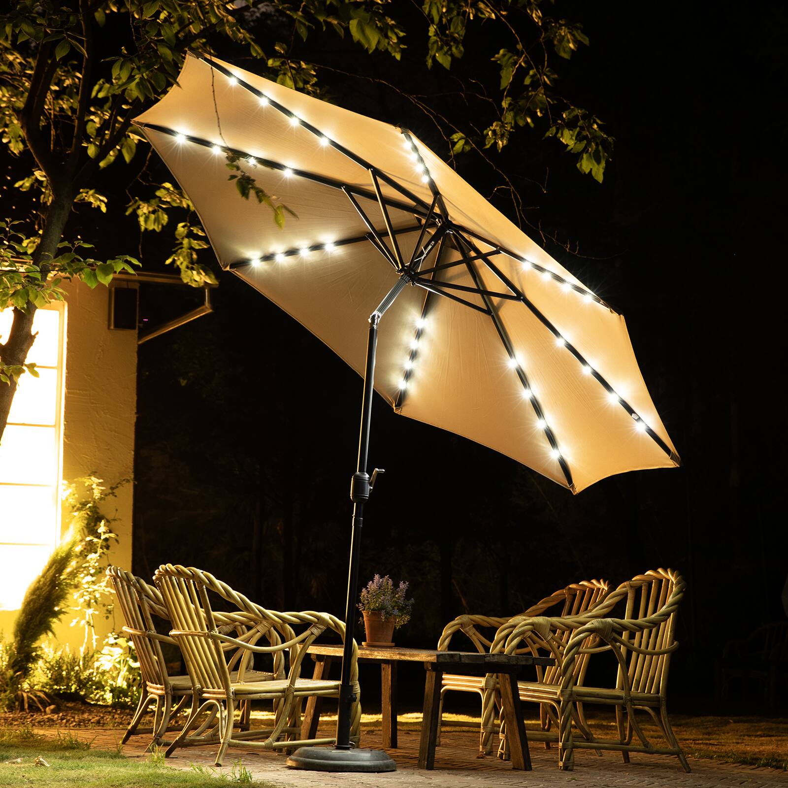 Back. AENKYO - 10ft Solar Polyester 32 LED Lighted Patio Umbrella with Tilt Adjustment and UV-Resistant Fabric - Khaki.