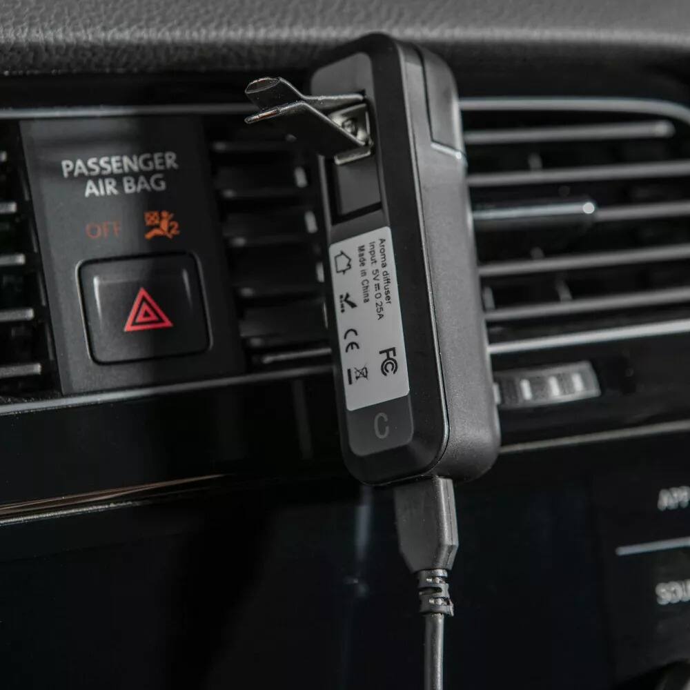 PASSENGER AIR BAG  
OFF 2  

Made in China  
Aroma S SV  
diffuser 25A  
CE  
20 FC  
C