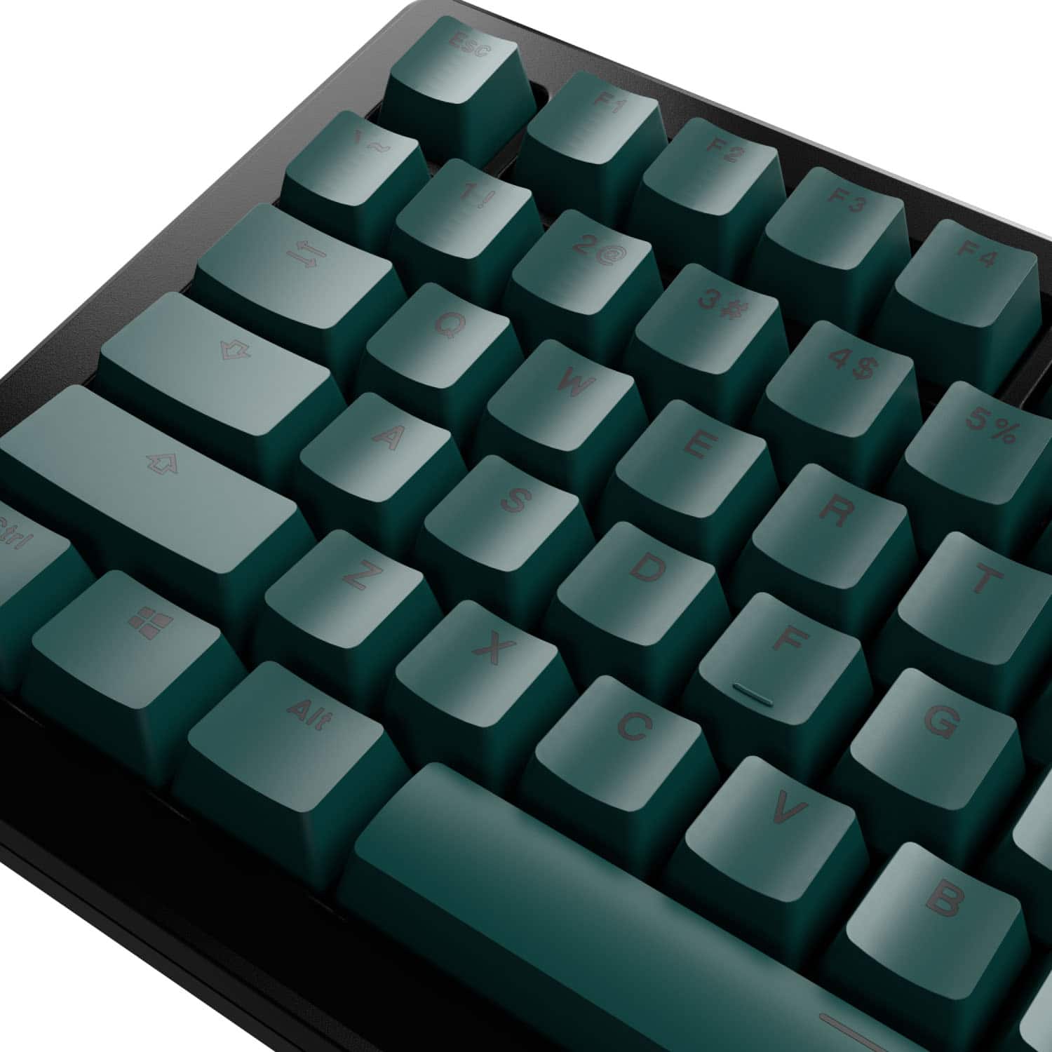 The image shows a close-up of a green computer keyboard. The keys include the numbers 1, 2, 3, 4, 5, 6, 7, 8, 9, 0, and the letters A, B, C, D, E, F, G, H, J, K, L, M, N, O, P, Q, R, S, T, U, V, W, X, Y, and Z. The keyboard also has a space bar and a few function keys, such as Esc, F1, F2, F3, F4, F5, F6, F7, F8, F9, F10, F11, F12, and Alt.