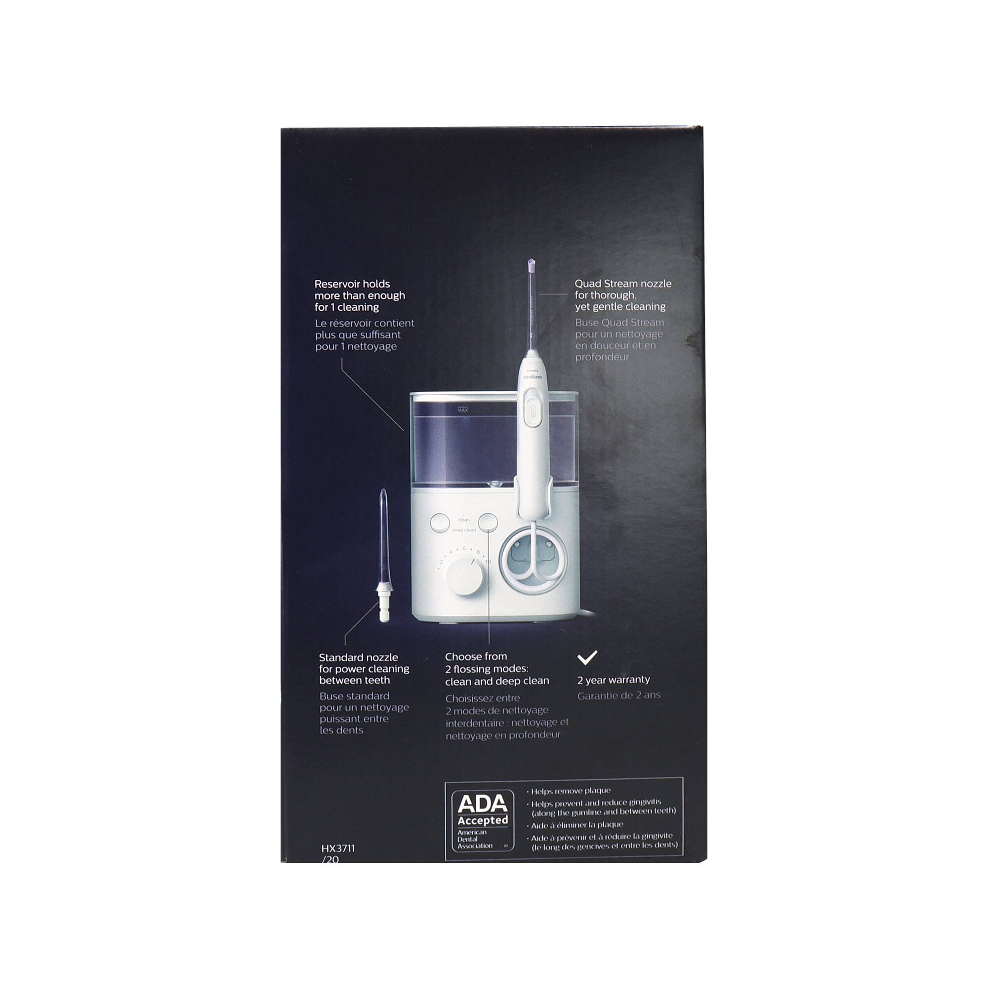 Reservoir holds more than enough for cleaning  
Le réservoir contient plus que suffisant pour le nettoyage  

Quad Stream nozzle for thorough yet gentle cleaning  
Buse Quad Stream pour un nettoyage en douceur et en profondeur  

Standard nozzle for powerful cleaning between teeth  
Buse standard pour un nettoyage puissant entre les dents  

Choose from 2 flushing modes: clean and deep clean  
Choisissez entre 2 modes de nettoyage interdentaire: nettoyage et nettoyage en profondeur  

2 year warranty  
Garantie de 2 ans  

ADA Accepted  
Accepté par l'ADA  

HX4711  
12/2021  

Helps remove plaque, food particles, and bacteria between teeth  
Aide à enlever la plaque, les particules alimentaires et les bactéries entre les dents