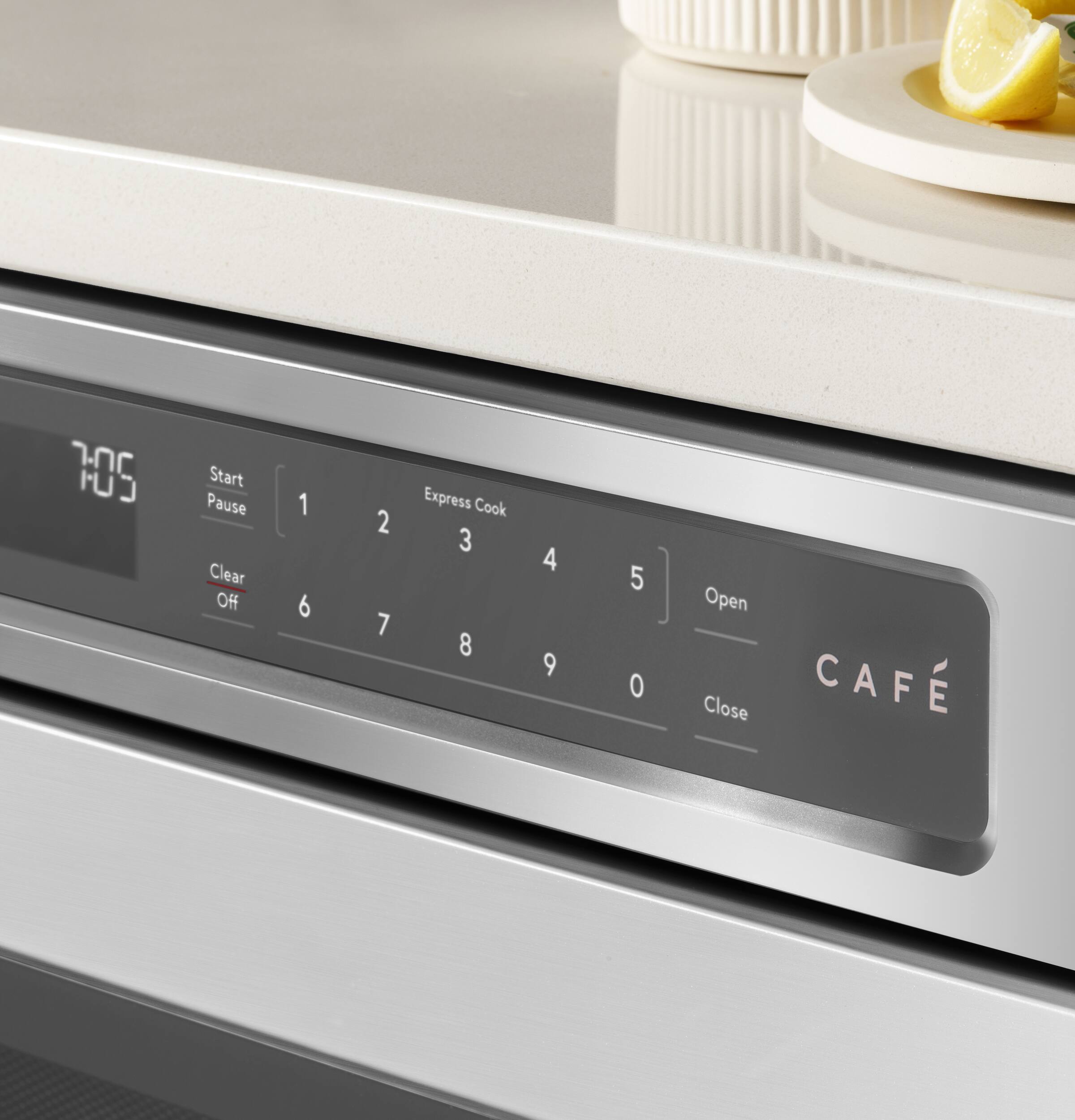 7:05 Start Pause Clear Off 1 2 3 4 5 Express Cook 6 7 8 9 0 Open Close CAFÉ