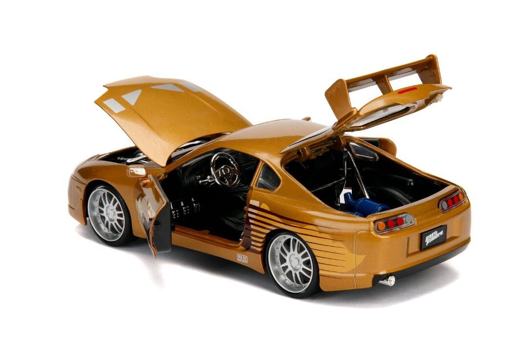 Alt View 3. Jada - Slap Jack's Toyota Supra Gold "Fast & Furious" Movie 1/24 Diecast Model Car by Jada.
