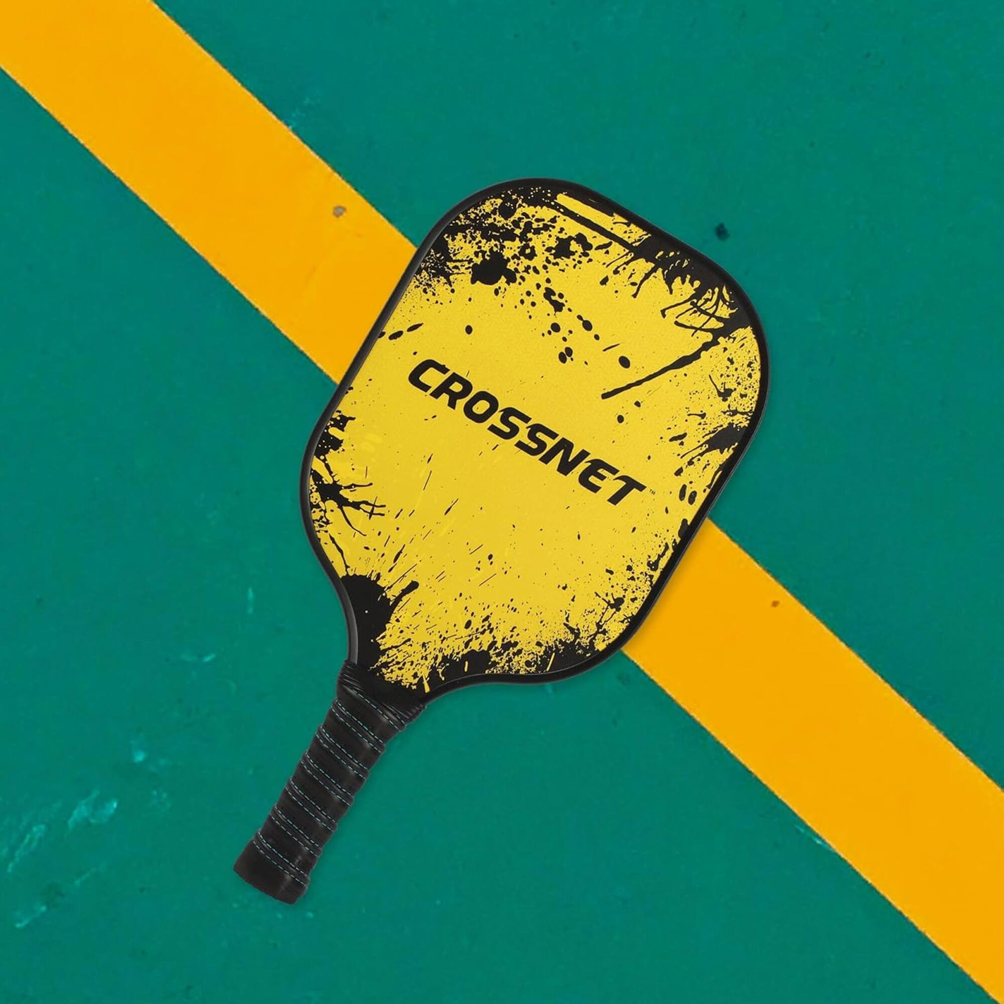 Alt View 1. CROSSNET - CROSSNET Pickleball Paddle with Fiberglass Face & Polymer Core, Cosmic Splatter - Black and Yellow.