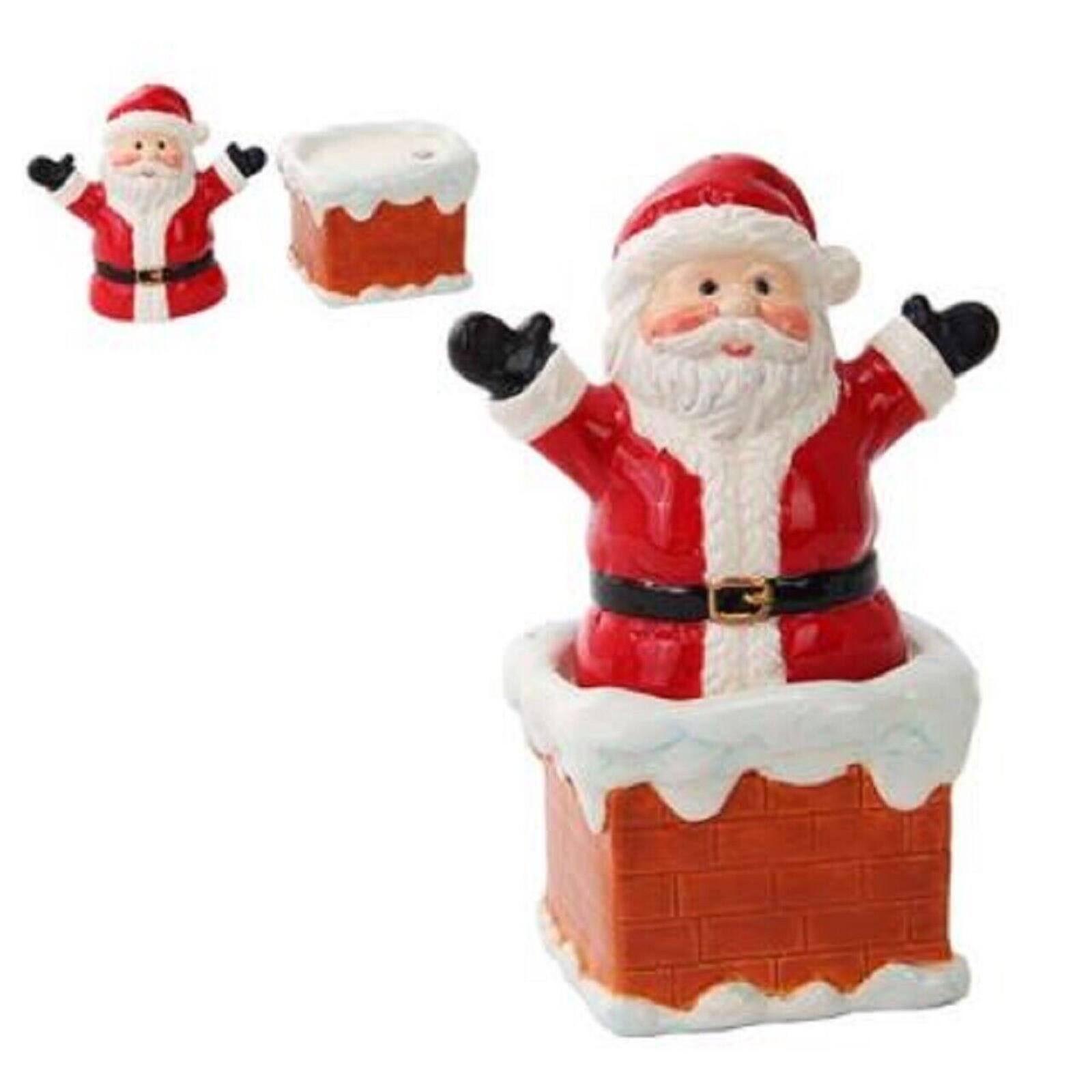 Angle. Pacific Trading - Santa On Chimney Ceramic Salt and Pepper Shakers - Red.