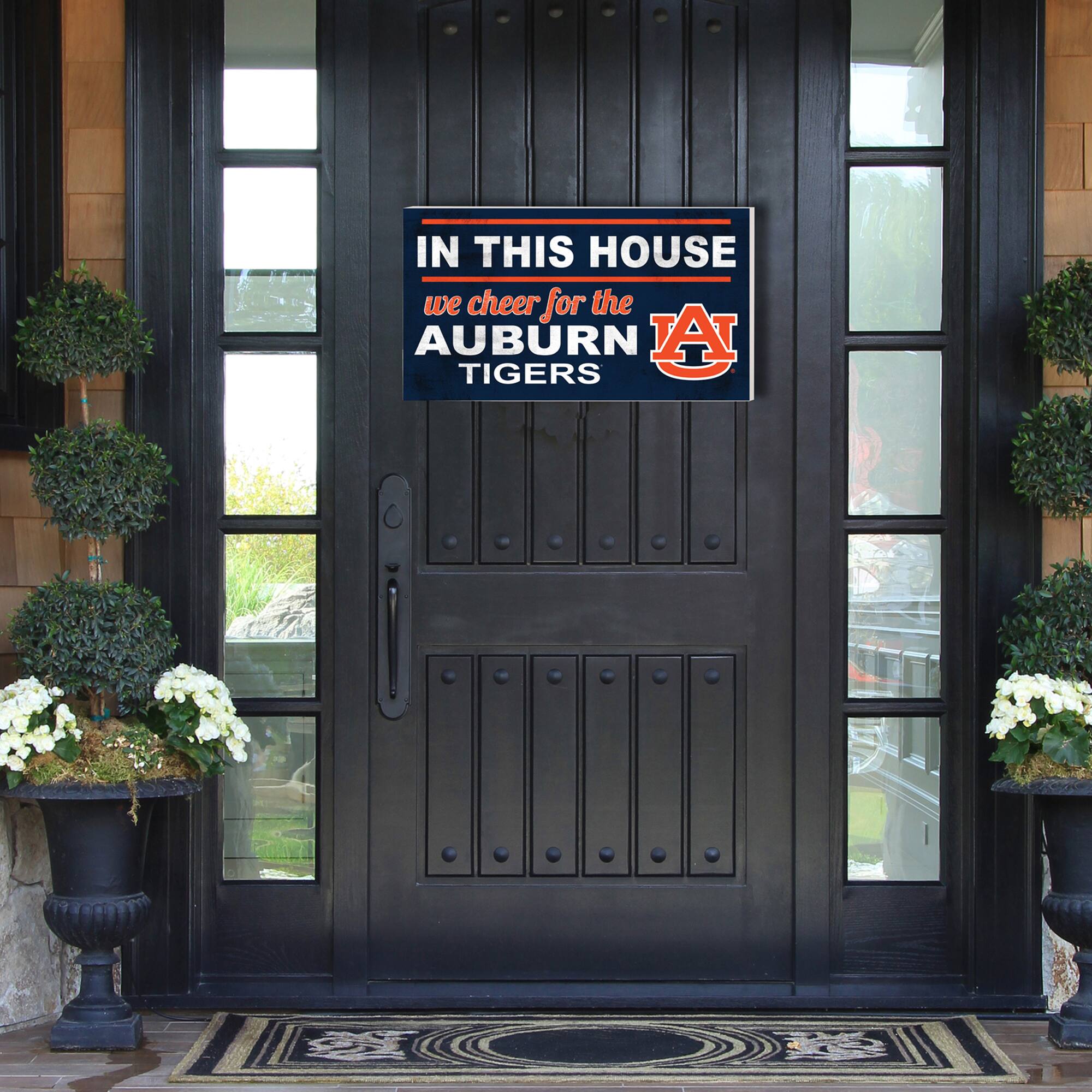 IN THIS HOUSE  
we cheer for the  
AUBURN TIGERS
