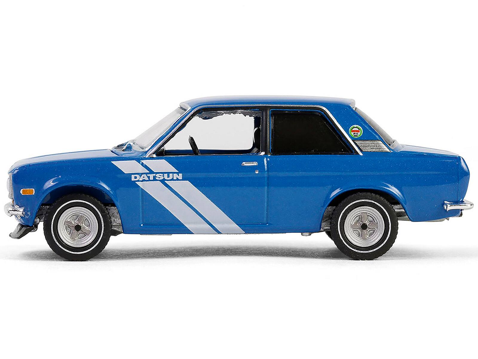 Left. Greenlight - 1972 Datsun 510 Blue Metallic with White Stripes "Show it Like it is - a Champion" "Vintage Ad Cars" Series 11 1/64 - Blue Metallic with White Stripes.