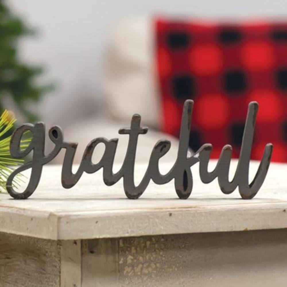 Angle. BreeBe - *Grateful Resin Sitter - Black.