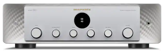 The image features a Marantz network integrated amplifier with a CD input. The amplifier has a volume control, source direct, treble, and bass controls. The device is designed to provide a high-quality audio experience for users.