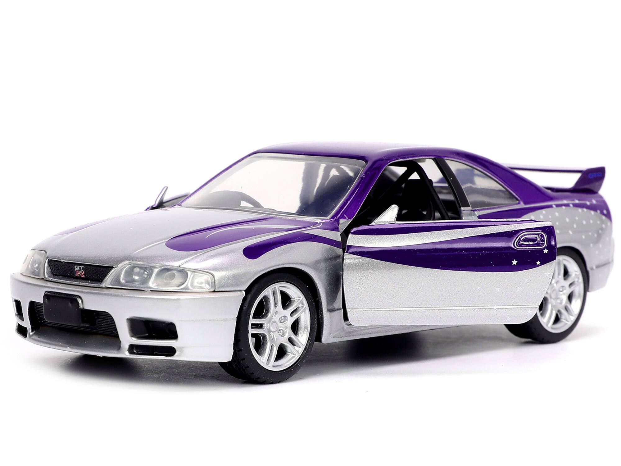 Angle. Jada - 1995 Nissan Skyline GT-R (BCNR33) Purple and Silver Metallic "Fast & Furious" Series 1/32 Diecast Model Car by Jada - Purple and Silver Metallic.