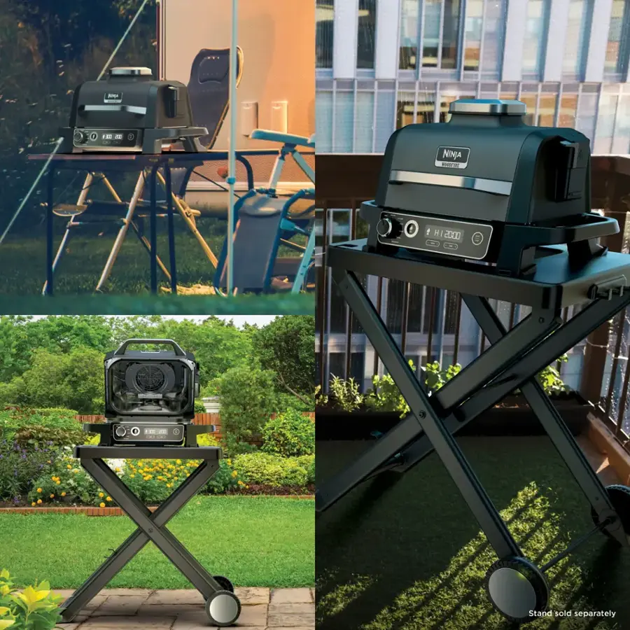 The image features a grill and a stand, with the grill being placed on the stand. The grill is black and has the brand name Ninja on it. The stand is also black and is designed to hold the grill. The grill is placed on a table, and there are chairs nearby. The scene is set in a backyard, with a building visible in the background. The grill is positioned on the stand, ready for use.