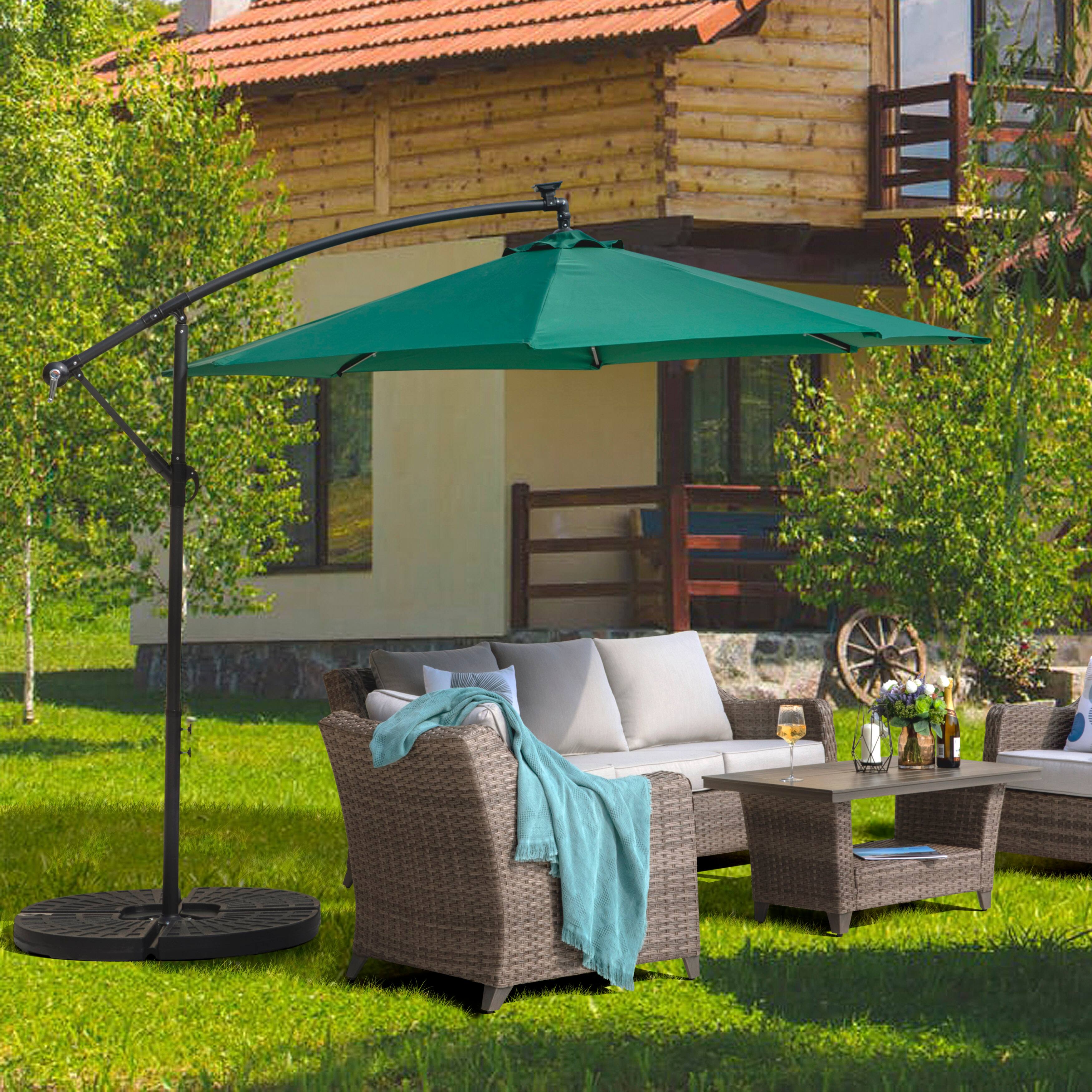 Left. Nuu Garden - Outdoor 4-Piece 52L Fan-shaped Patio Umbrella Base, HDPE Plastic, Black - Black.