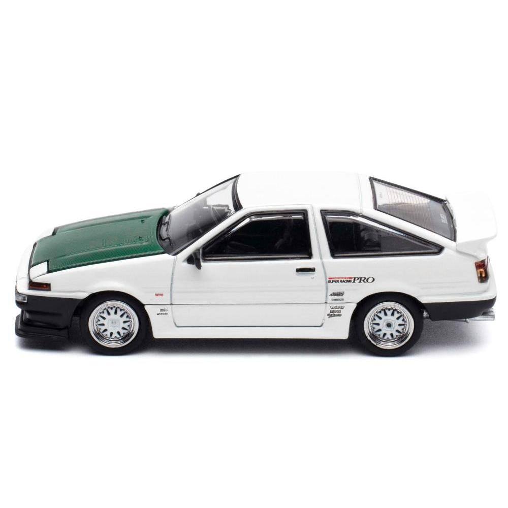 Left. Hobby Japan - Toyota Sprinter Trueno AE86 RHD Keiichi Tsuchiya Dori Dori Mesh Wheels White Green Carbon Hood 1/64 Model - White with Green.