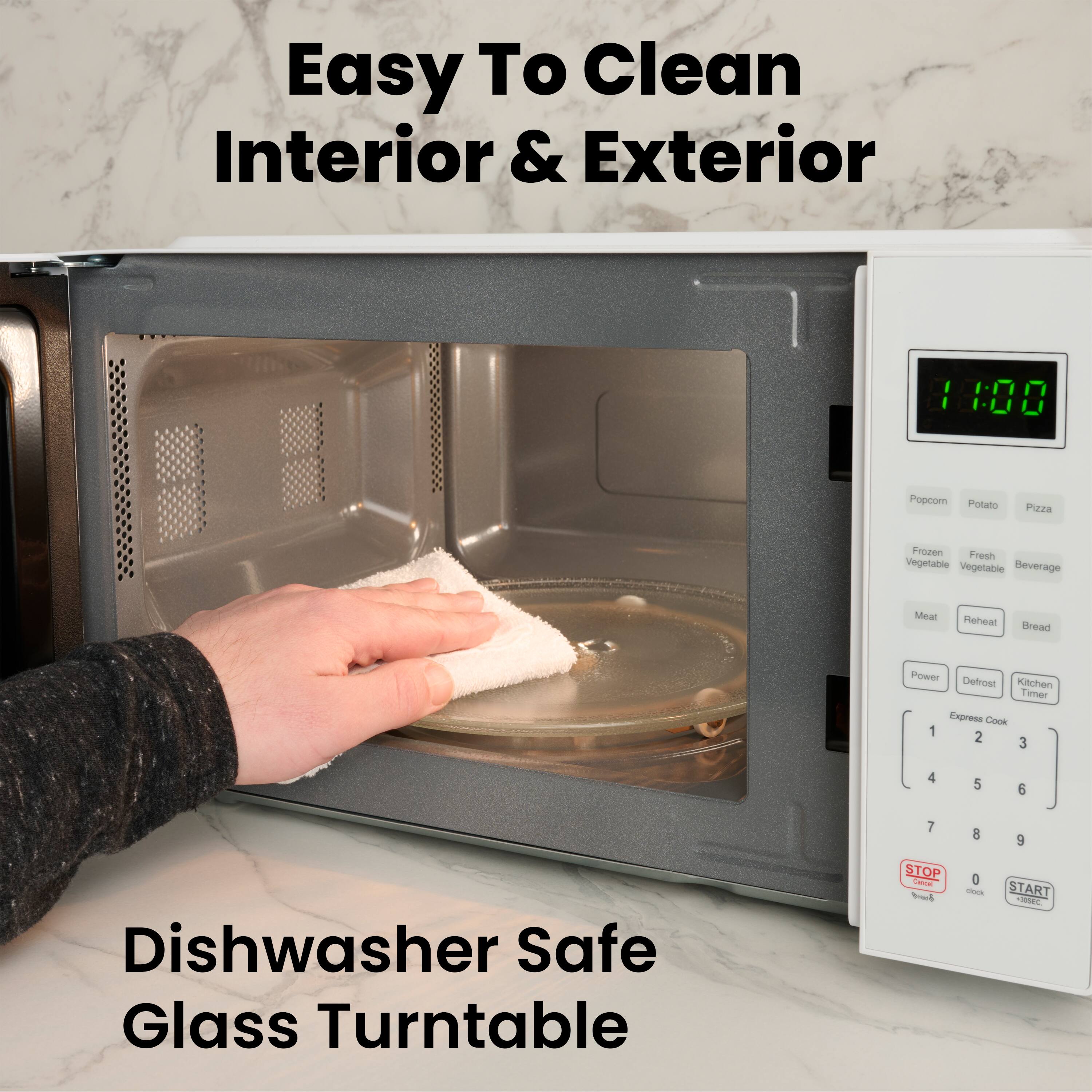 Easy To Clean Interior & Exterior

Dishwasher Safe Glass Turntable

11:00

Popcorn Potato Pizza
Frozen Vegetable Fresh Vegetable Beverage
Meat Reheat Bread

Power Defrost Kitchen Timer
Express Cook

1 2 3
4 5 6
7 8 9
0

STOP START