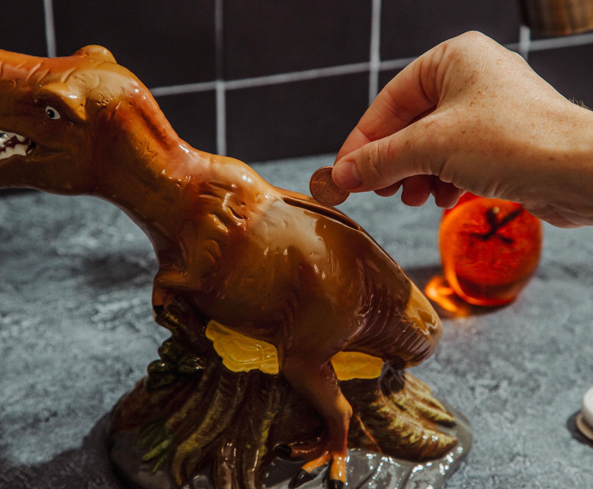 Alt View 4. Silver Buffalo - Jurassic World T-Rex 6-Inch Ceramic Sculpted Coin Bank Storage - Brown.