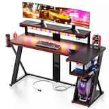 Bestier - 57-inch L-Shaped Gaming Desk, RGB Music Sync LED Lights, 3 AC Power Outlets, Dual Cup Holders for Gaming Room - Black