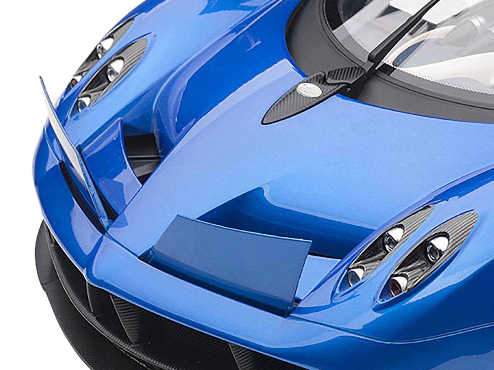Angle. Autoart - Pagani Huayra Metallic Blue with Black Top and Silver Wheels 1/12 Model Car by Autoart - Metallic Blue with Black.