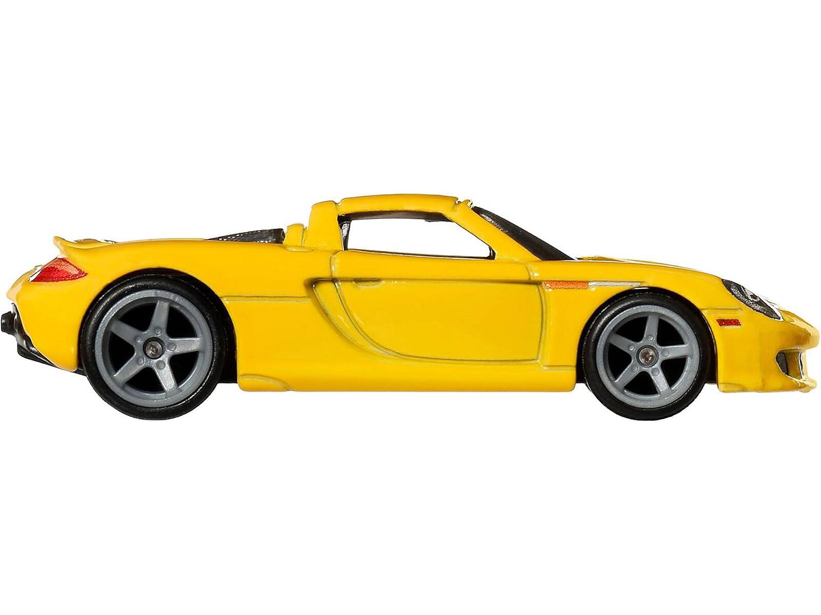 Angle. Hot Wheels - Porsche Carrera GT Yellow "Timeless Icons" Series Diecast Model Car by Hot Wheels - Yellow.