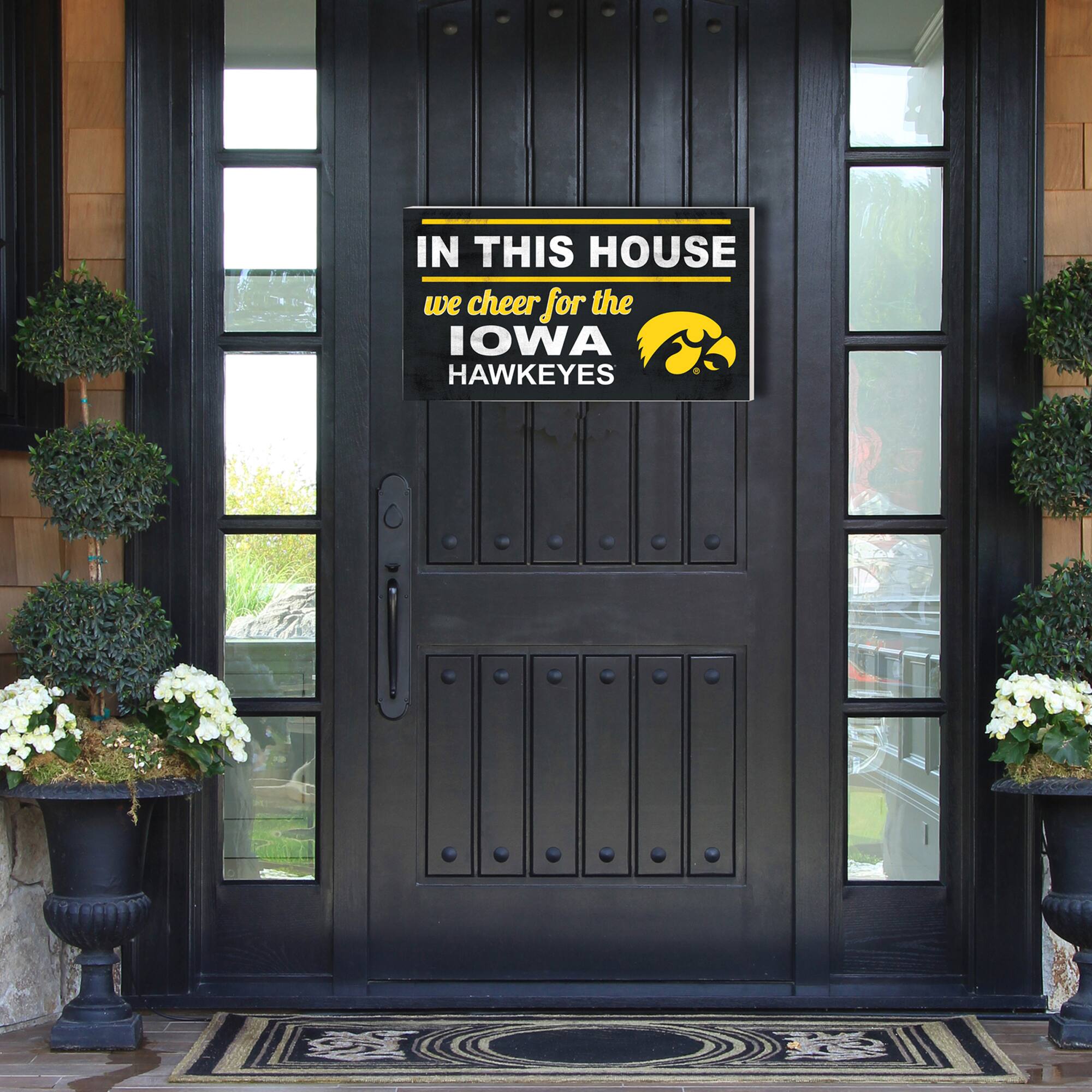IN THIS HOUSE  
we cheer for the  
IOWA HAWKEYES