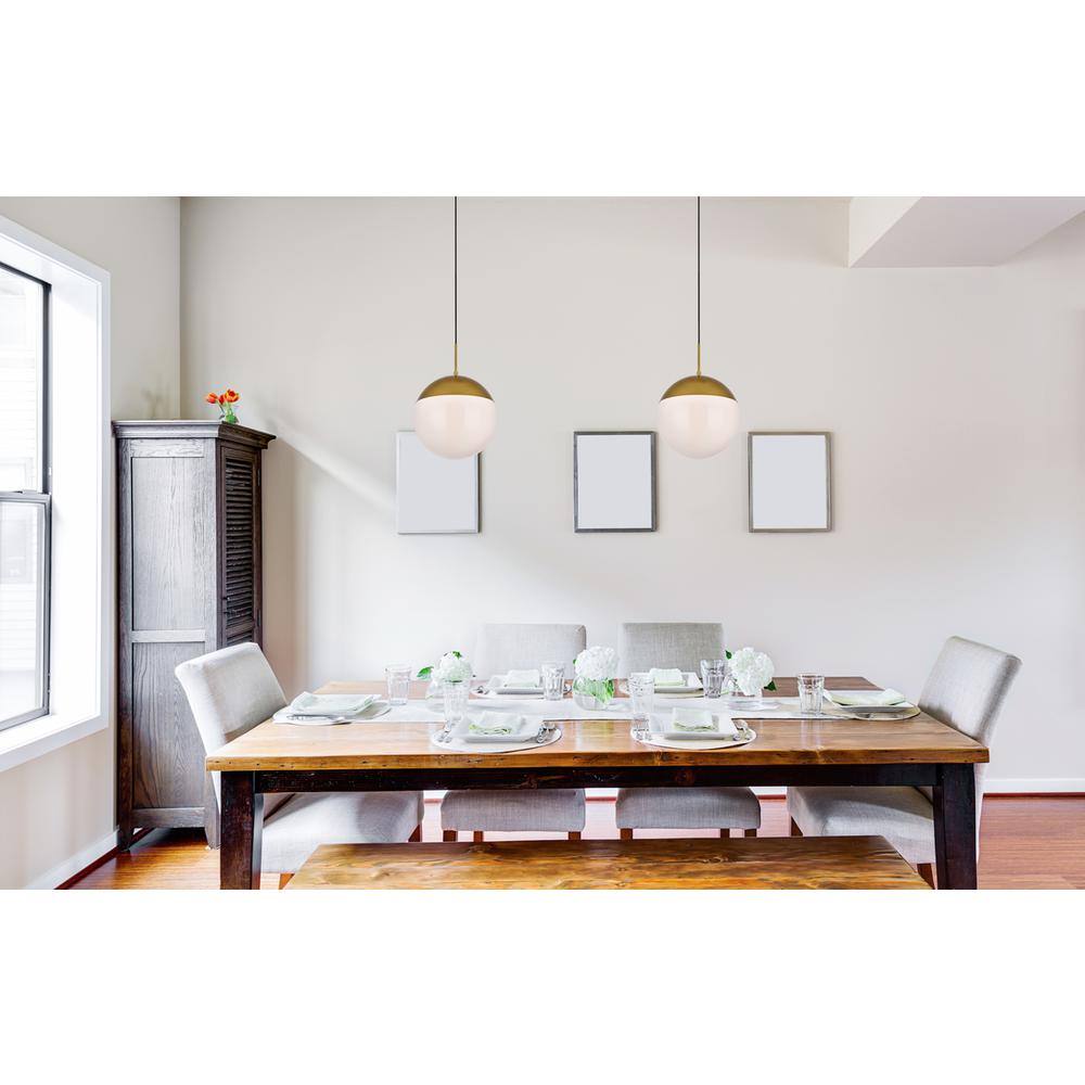 Angle. Living District - Eclipse 1 Light Brass Pendant With Frosted White Glass - Brass And Frosted White.