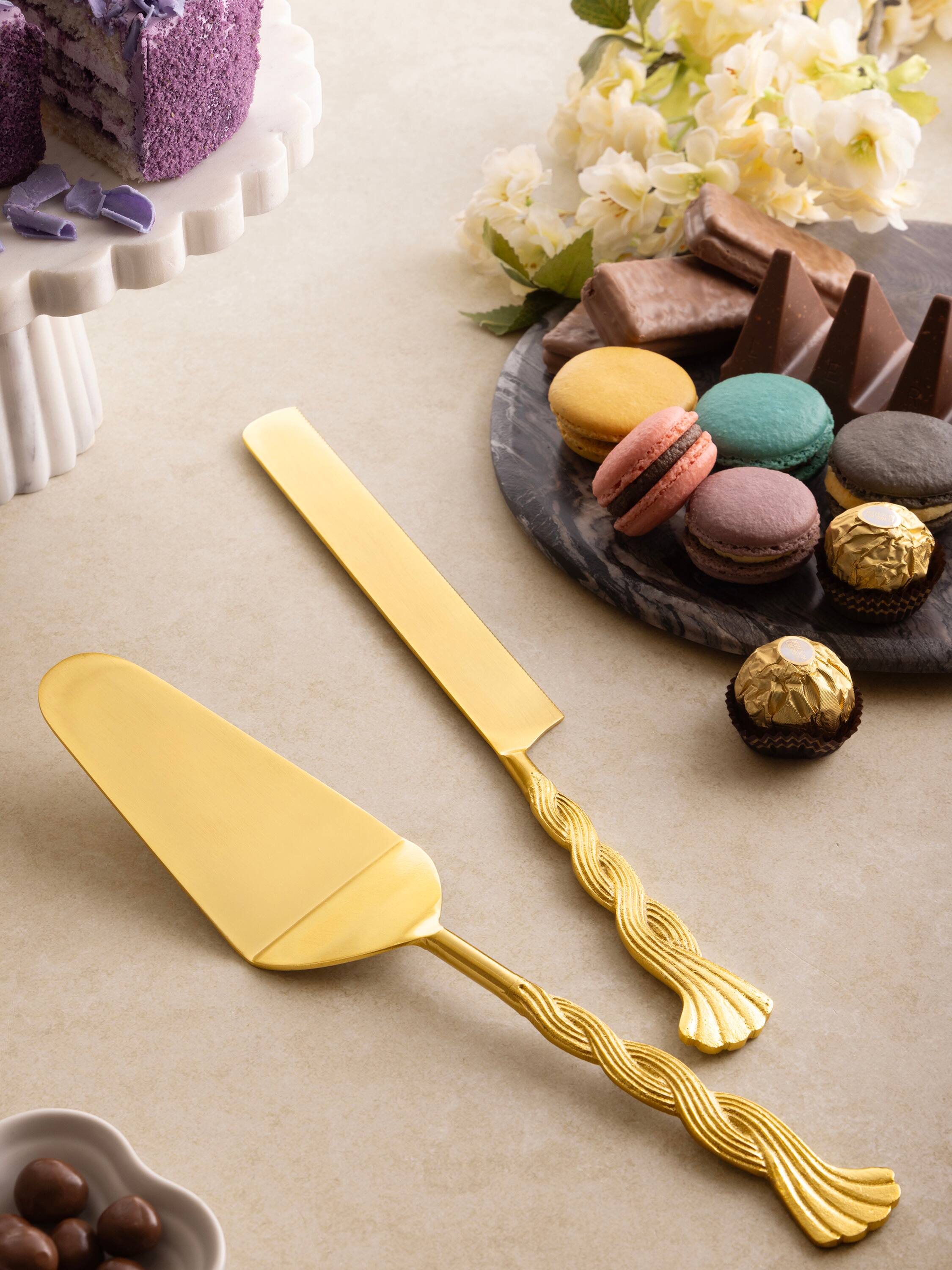 Left. GAURI KOHLI - Santiago Cake Servers - Matte gold.
