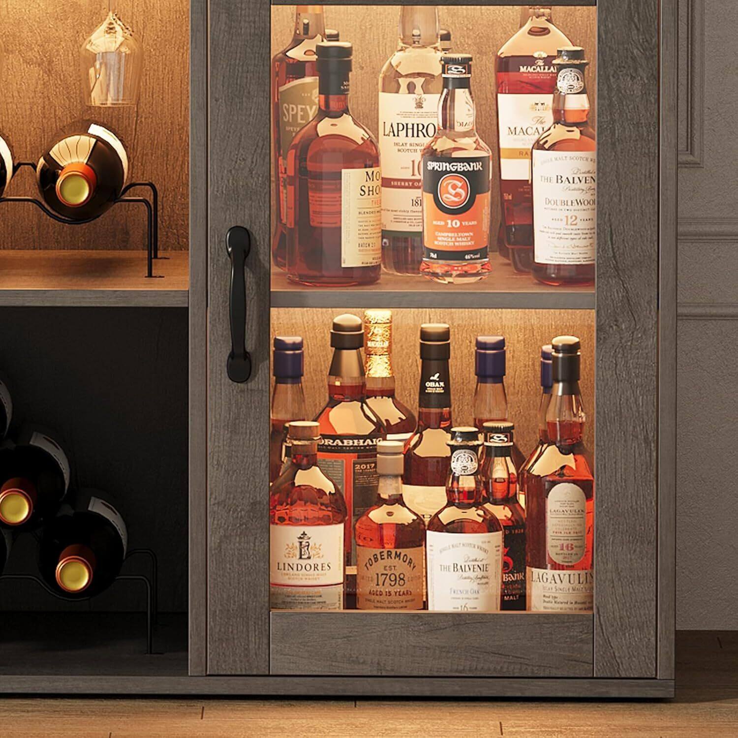 Sure, here is the corrected and grouped text from the image:

---

**Top Shelf:**

- **Speyburn**
- **Laphroaig**
- **Springbank**
- **Macallan**
- **The Balvenie**
- **Doublewood**
- **12 Years**

**Bottom Shelf:**

- **Lindores**
- **Glenrothes**
- **The Balvenie**
- **1798**
- **15 Years**
- **Lagavulin**
- **16 Years**

---

This groups the text by the labels visible on the bottles in the image.