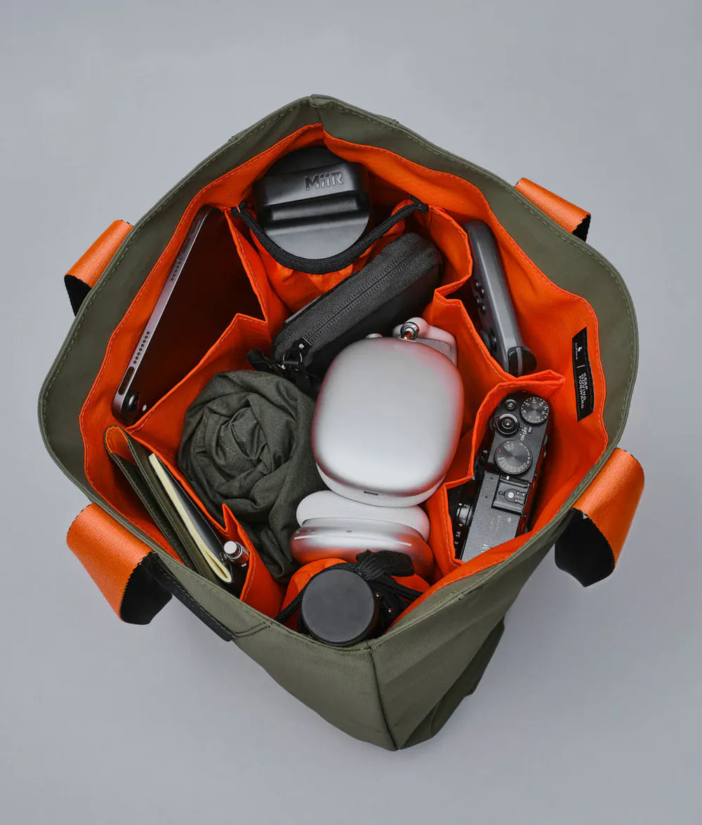 Alt View 4. ALPAKA - Elements Tote Bag 14.5L Weatherproof Foldable Travel Tote with Magnetic Closure - Green Axoflux 210D.