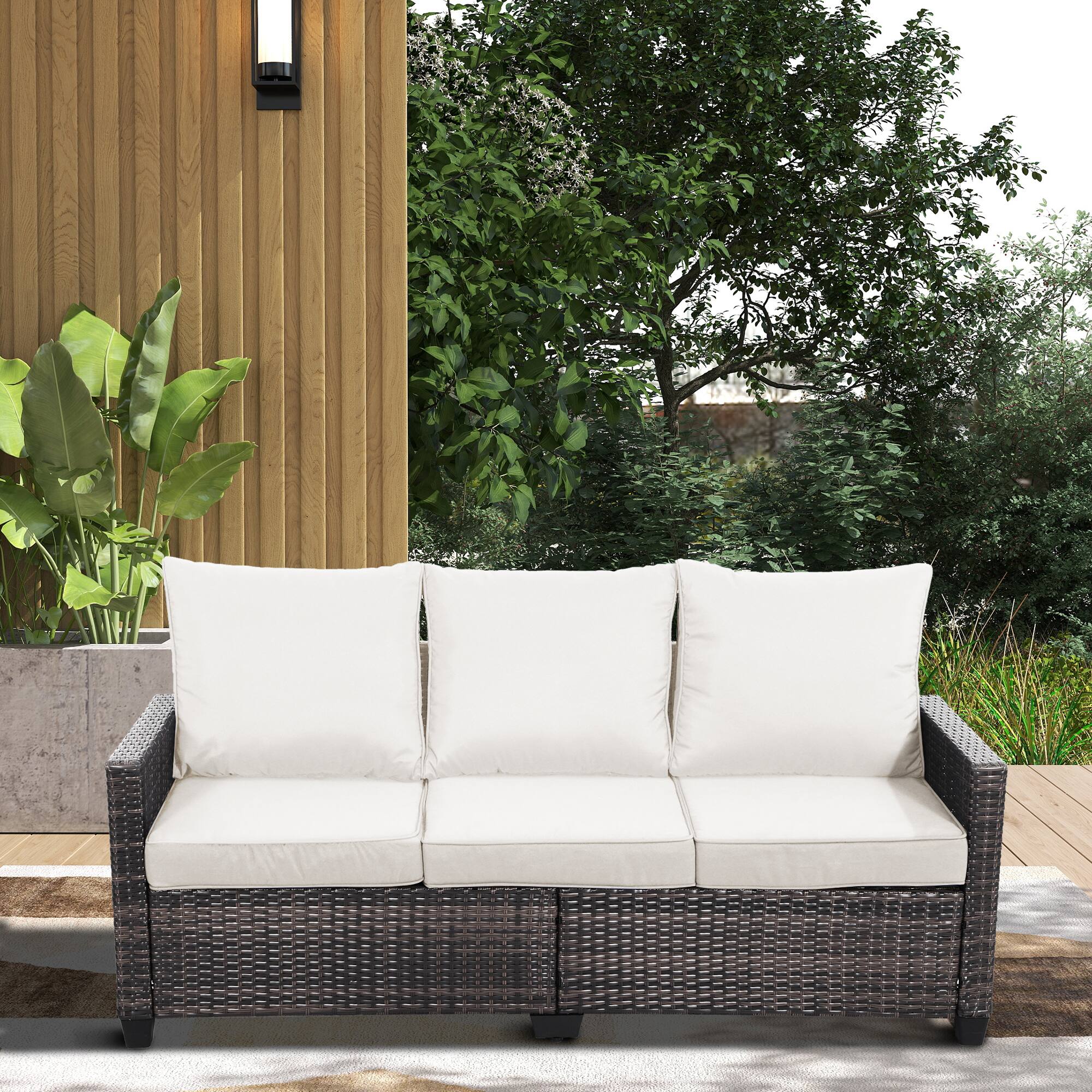 Left. Decksplore - All-weather three-seater wicker patio sofa, premium outdoor furniture featuring brown wickerwork and thickened cushions - Off-white.
