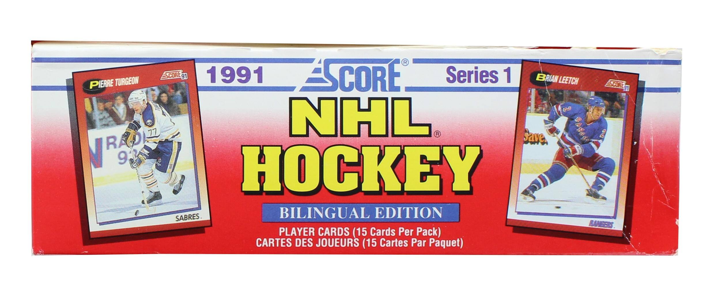 Sure, here is the corrected and grouped text from the image:

---

**1991 SCORE NHL HOCKEY**  
**BILINGUAL EDITION**  
**Series 1**  

**PLAYER CARDS (15 Cards Per Pack)**  
**CARTES DES JOUEURS (15 Cartes Par Paquet)**  

**Pierre Turgeon**  
**91**  
**SABRES**  

**Brian Leetch**  
**91**  
**RANGERS**  

---

This text is organized to reflect the information on the packaging, including the player names, team names, and the bilingual edition details.