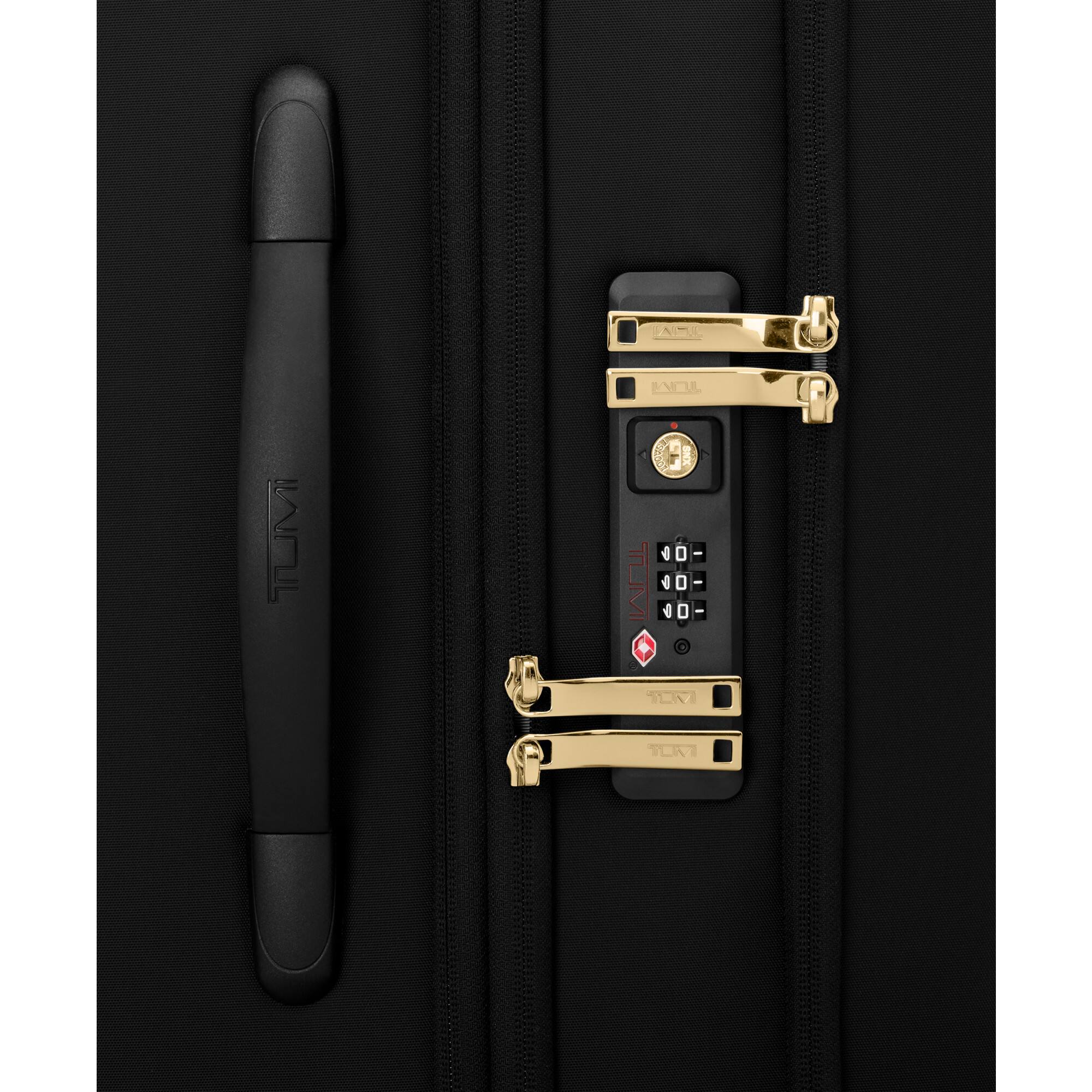 The text on the image is "TUMI."