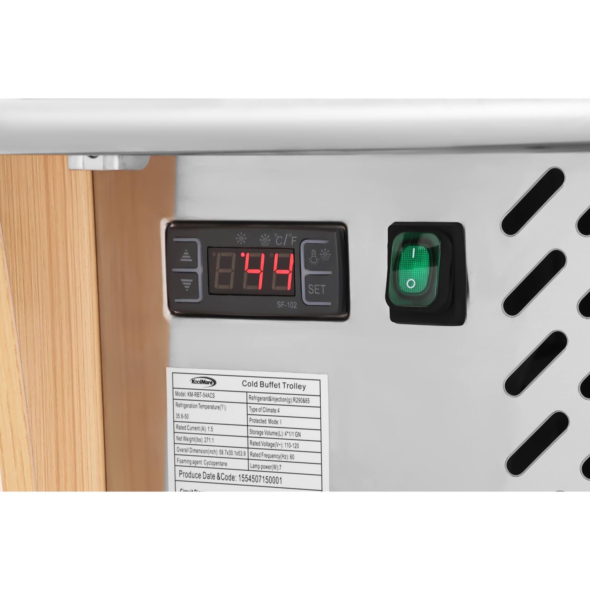 The text on the image reads:

"ClF 888 SET SF-102 I O KoolMaro Cold Buffet Trolley Wode M-RBT-S4ACS Refrigeration/Microwave Type d Cinate 1 3 6-50 Protected Wade I Rated Current 1.9 A 19 Storage Jemulci J 411 CA N  th 1 Rated Voltage(V-) 710-120 Dieral  Simenson(inch) a T0 Ehat : Rated Fqenc De Foaming agent Cyclopertane Lamg p0Ne(W)7 Produce Date &Code: 1554507150001"