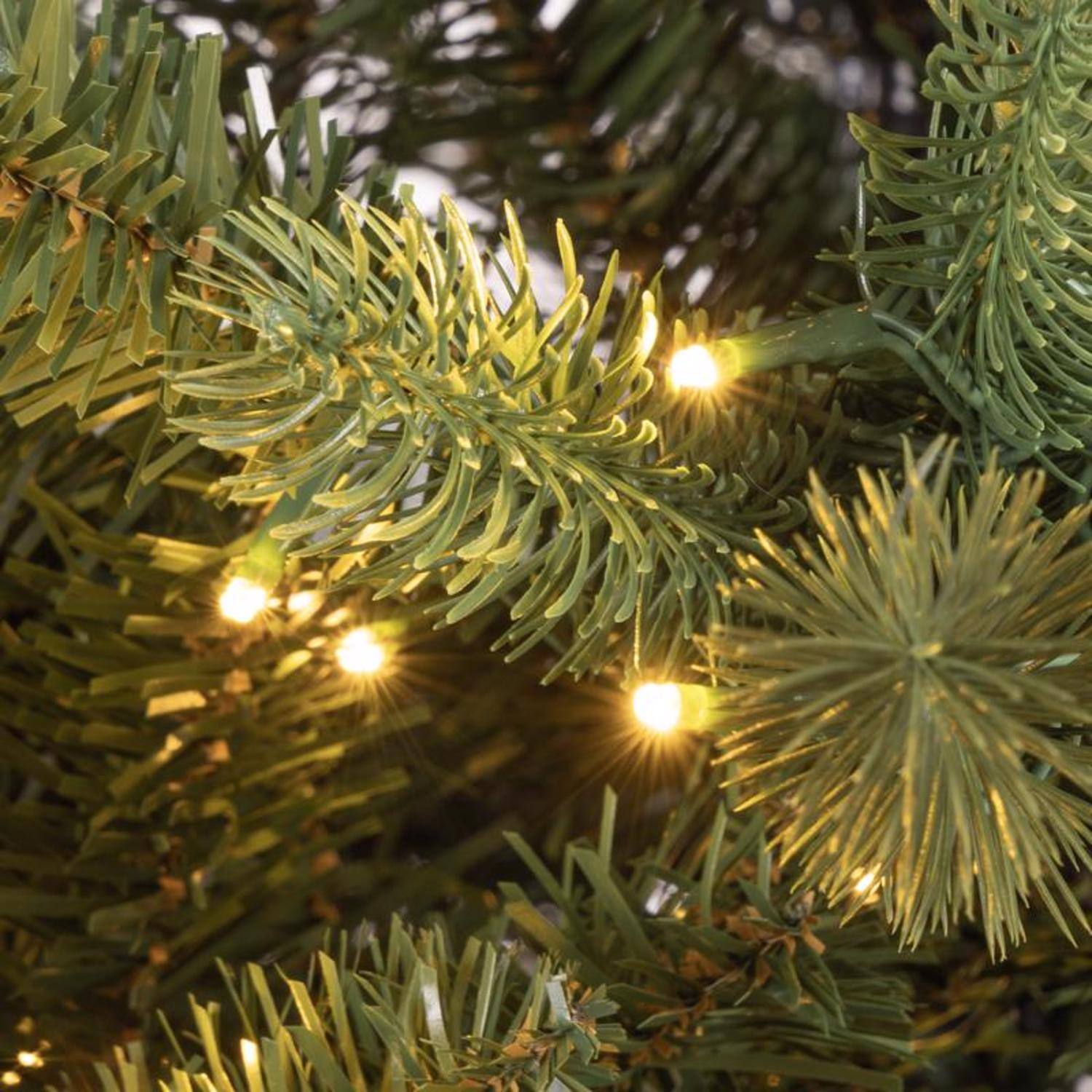 Left. Celebrations - Celebrations 4 ft. Pencil LED 150 ct Grand Illum Color Changing Christmas Tree - Green.
