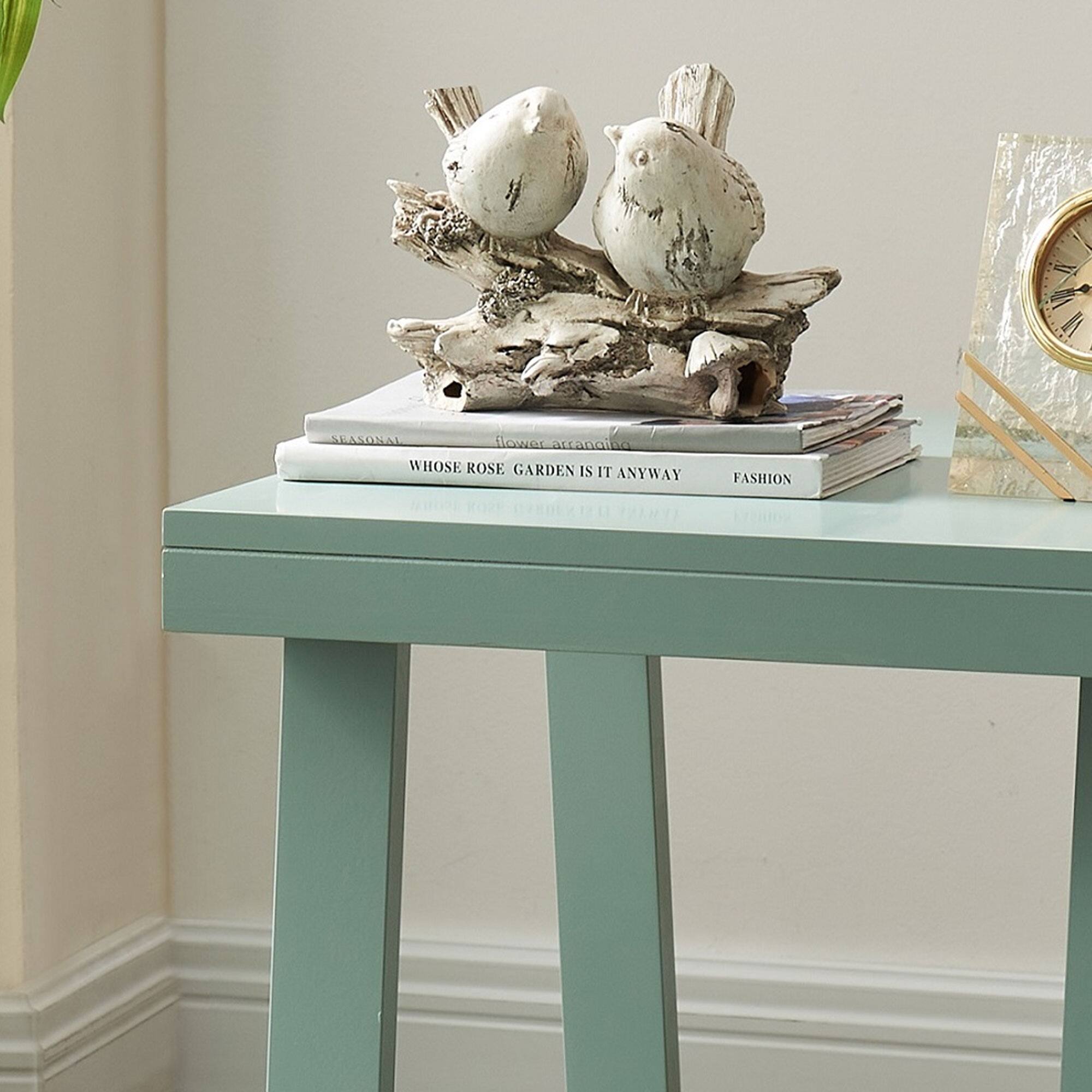 C M V SLASOAN  
flower arrangement  
WHOSE ROSE GARDEN IS IT ANYWAY  
FASHION