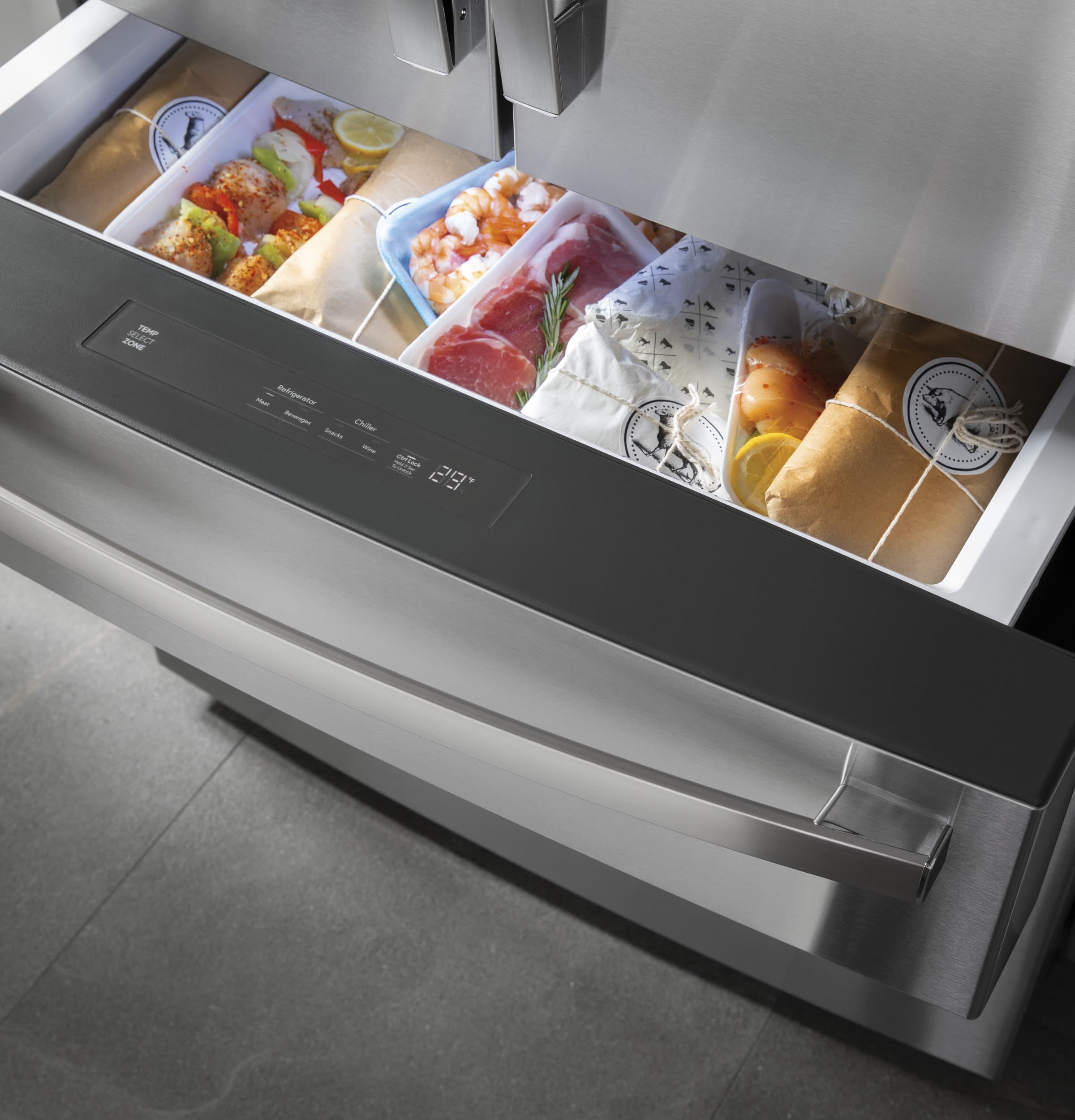 The text on the image reads "CIRO NLCT TEP ZONE nothing to chuter Sacks - 89 b." This text is likely related to the settings or features of the refrigerator, such as temperature zones or storage compartments.