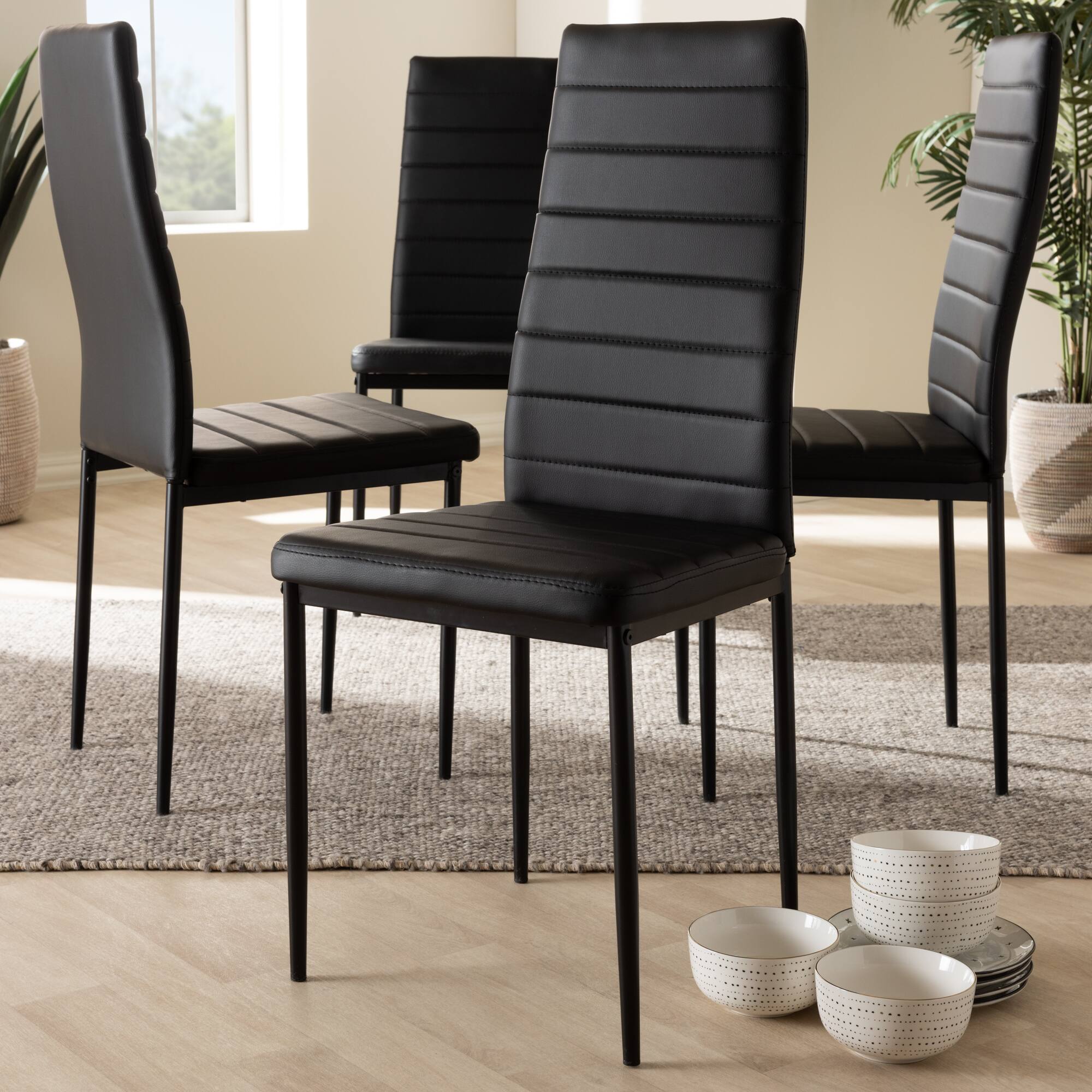 Left. Baxton Studio - Set of 4 Armand Modern and Contemporary Faux Leather Upholstered Dining Chairs - Black.