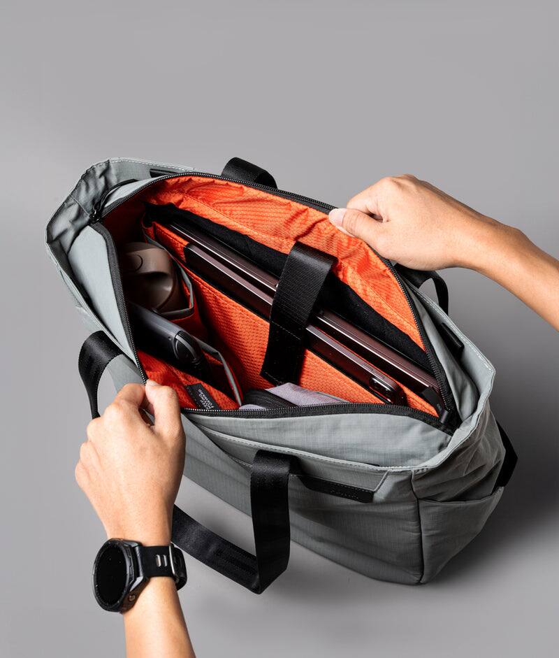 Left. ALPAKA - Metro Tote Laptop Tote Bag for Work, Work Tote Fits 16" MacBook Pro, Side Bottle Pocket, Weather-Resistant, Key Tether - Grey Axoflux 210D.