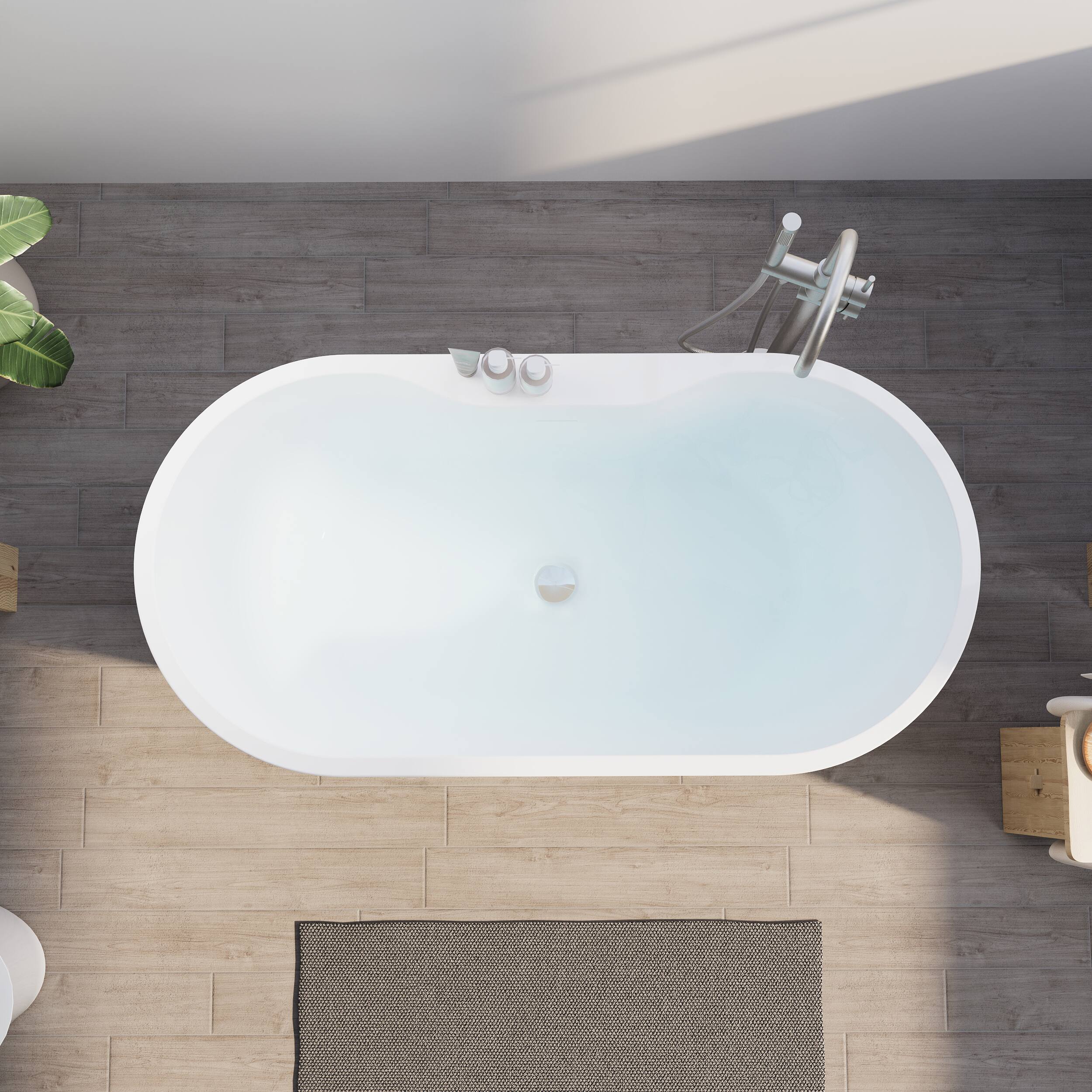 Left. WELLFOR - Nava 57 in. x 29.5 in. Acrylic Oval Freestanding Soaking Bathtub with Center Drain and Widened Deck for Storage - White.