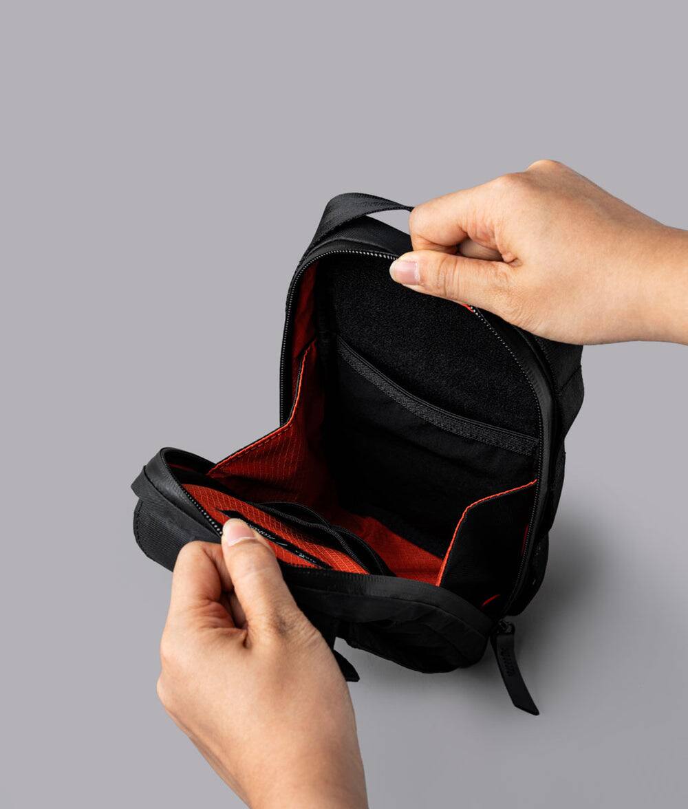 Alt View 5. ALPAKA - Modular Sling V2 MIini Sling Bag for Phone, Magnetic Quick Access, EDC Crossbody Bag with Adjustable Strap - Black X-Pac VX21.