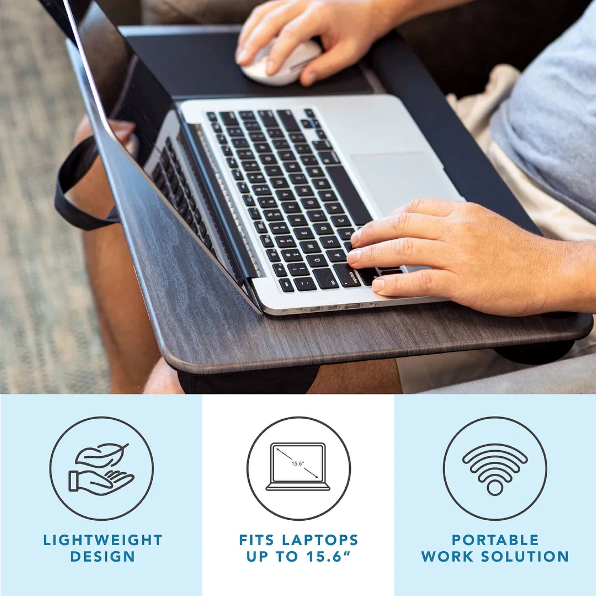 A person is using a laptop computer on their lap. The laptop is placed on a lap desk, which is designed to provide a comfortable and ergonomic workspace. The lap desk is lightweight and can accommodate laptops up to 15.6 inches in size. It is a portable solution for those who want to work on the go or in various locations.