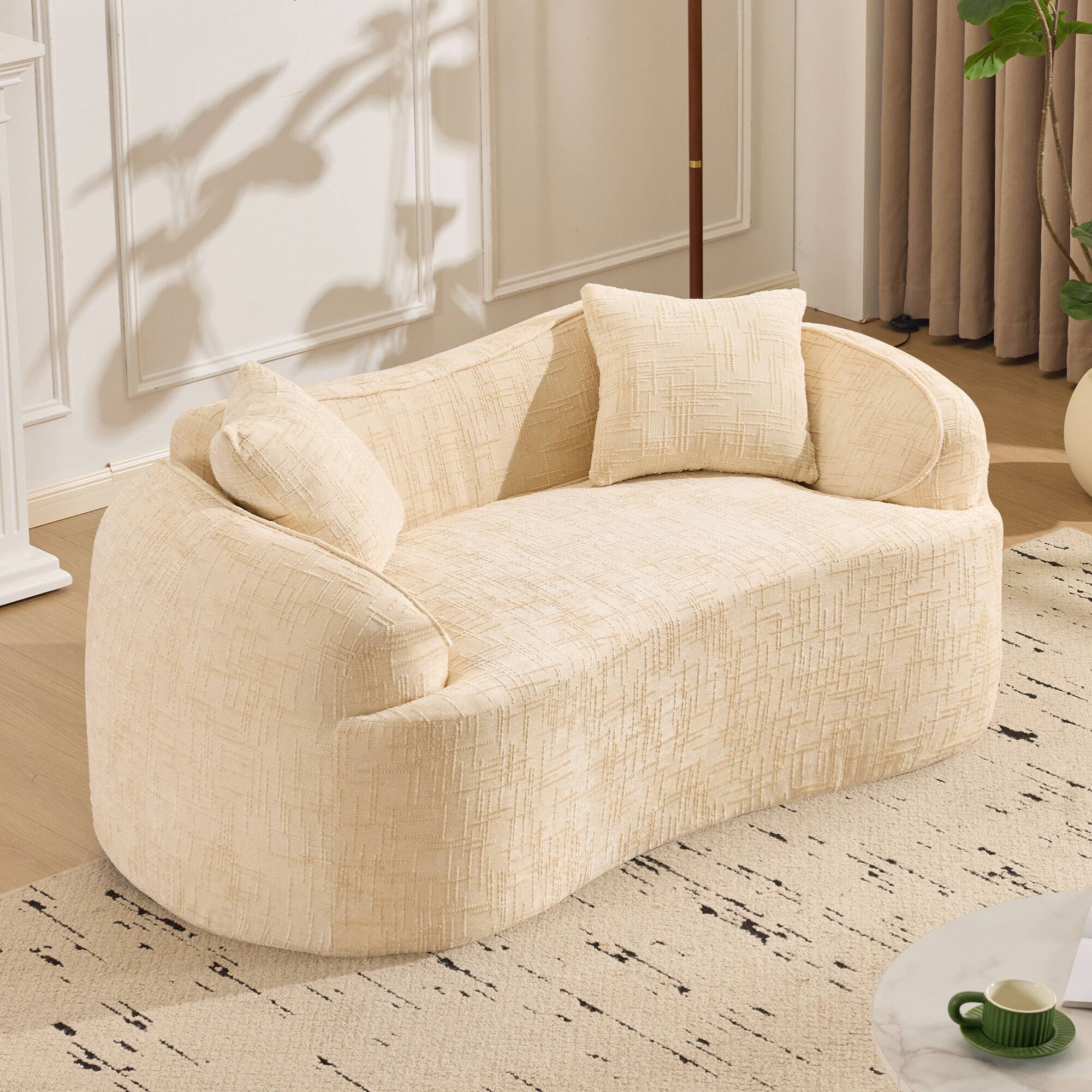 Angle. GOODSILO - Curved Two-Person Compression Sofa with Pillows for Small Spaces - Beige.