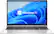 Windows 11 is the operating system displayed on the laptop screen.