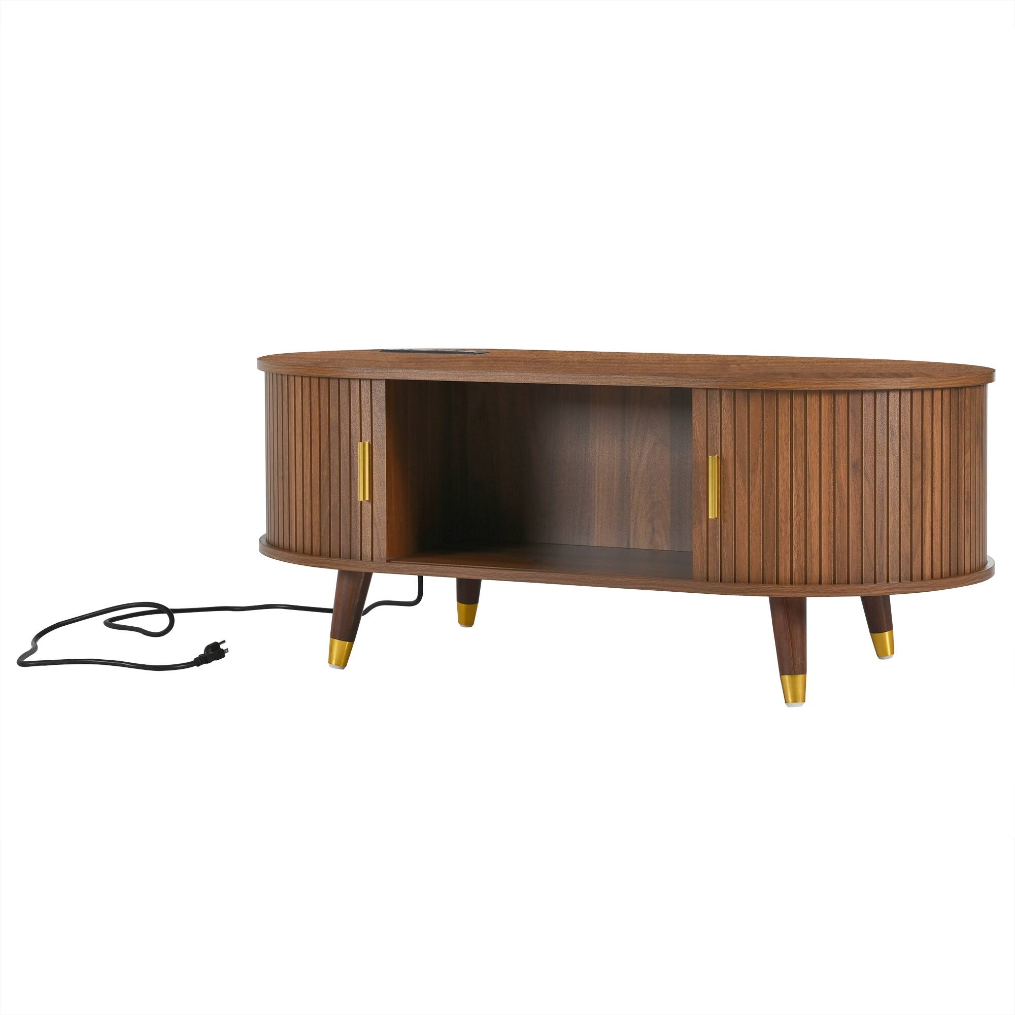 Angle. Lirago - 43" Century Farmhouse Wooden Oval Coffee Table Fluted Design with Charging Station Sliding Tambour Door Solid Wood Legs - Brown.