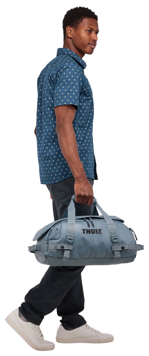 Alt View 1. Thule - Chasm Duffel Bag – Compact 30L Durable Adventure & Travel Organizer - Pond Gray.