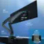 The text on the image can be grouped and corrected as follows:

1. 360 Rotation: The image features a 360-degree rotation, which allows for a full range of motion.
2. +85-30 Tilt: The monitor can be tilted up to 85 degrees or down to 30 degrees, providing flexibility in viewing angles.
3. 22.04" Max Height: The maximum height of the monitor is 22.04 inches, which is important for ergonomic viewing.
4. 360 Rotation: The image also shows a 360-degree rotation, which is useful for adjusting the monitor's position.
5. 360 Rotation: The image emphasizes the 360-degree rotation feature, which allows for easy adjustment of the monitor's position.
6. 26" Max Extension: The monitor can be extended up to 26 inches, providing additional flexibility in adjusting the monitor's position.