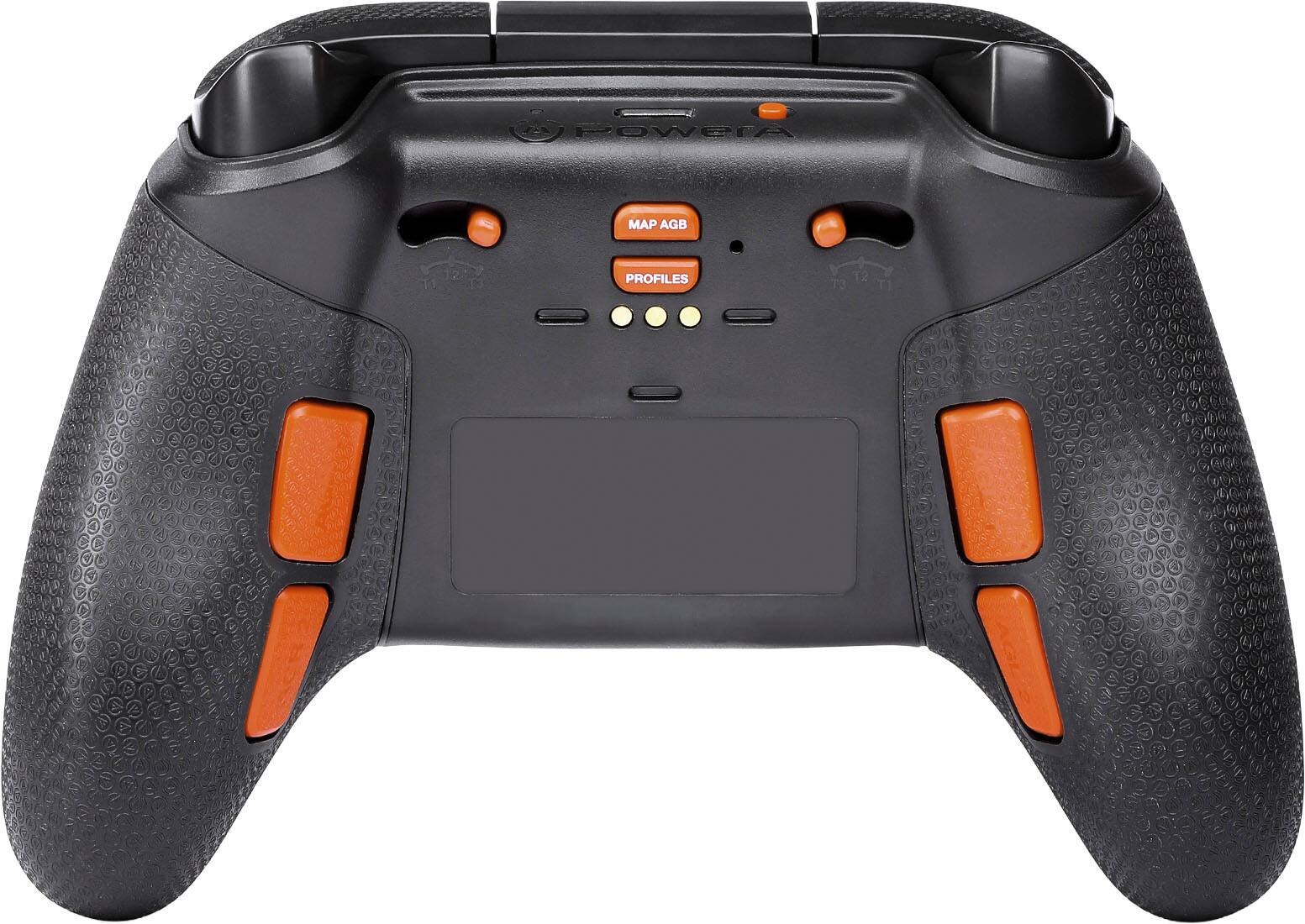 The image shows a black and orange game controller with a power button, a map button, and two profile buttons.