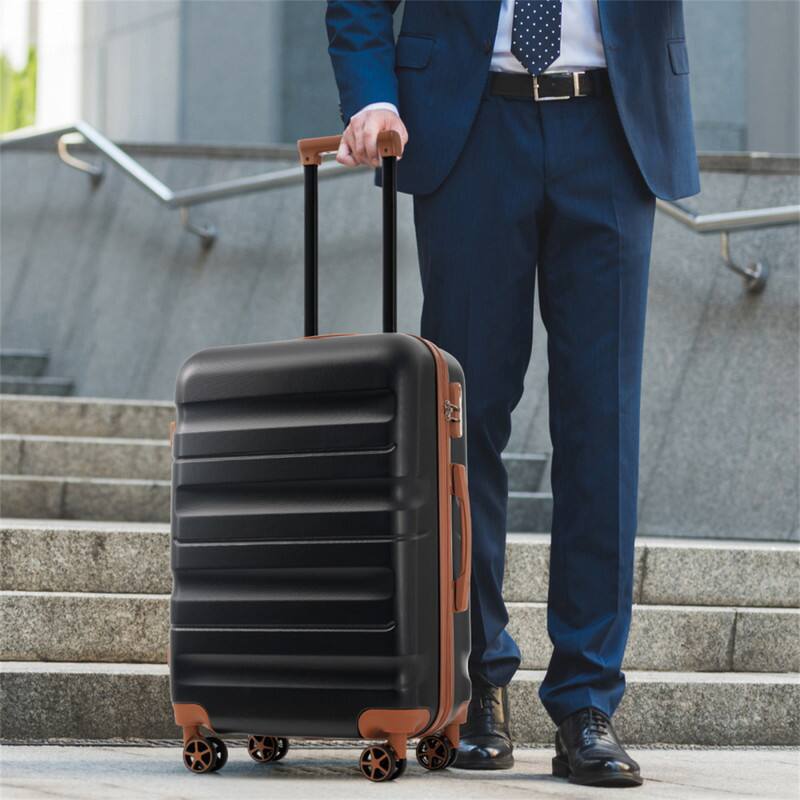 Angle. HTUTWOO - Hardshell ABS Luggage Set - Lightweight & Durable Suitcases, Dual Spinner Wheels, Carry-On & Check-In Sizes for Travel - Black.