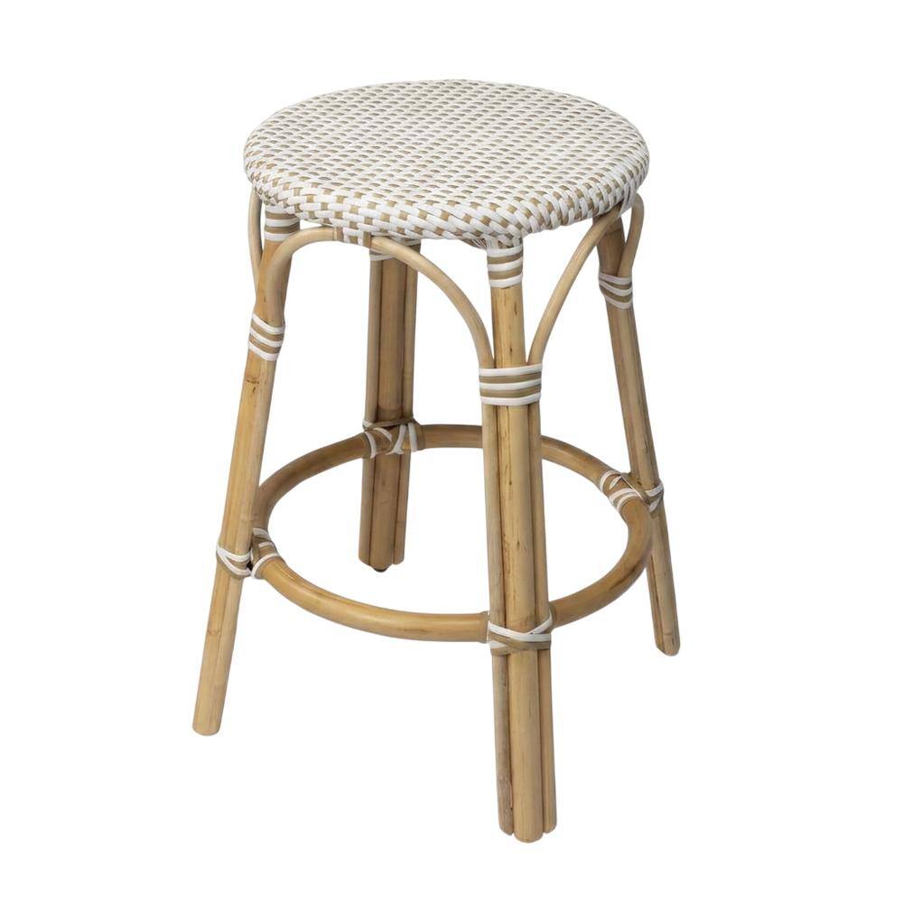 Angle. Butler Specialty - Tobias Rattan Round 24" Counter Stool - White And Tan Dot.