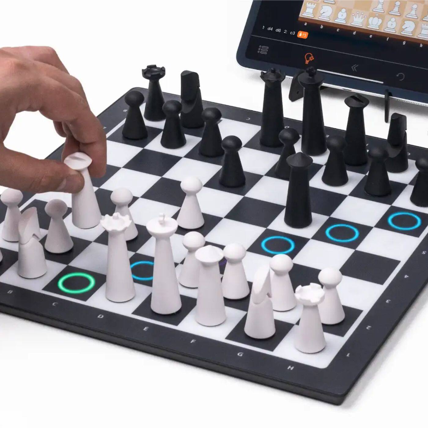 Left. Particula - GoChess Mini – AI Electronic Chess Board with Lights & Online Play, Great for All Ages & Skill Levels - Classic Black & White.