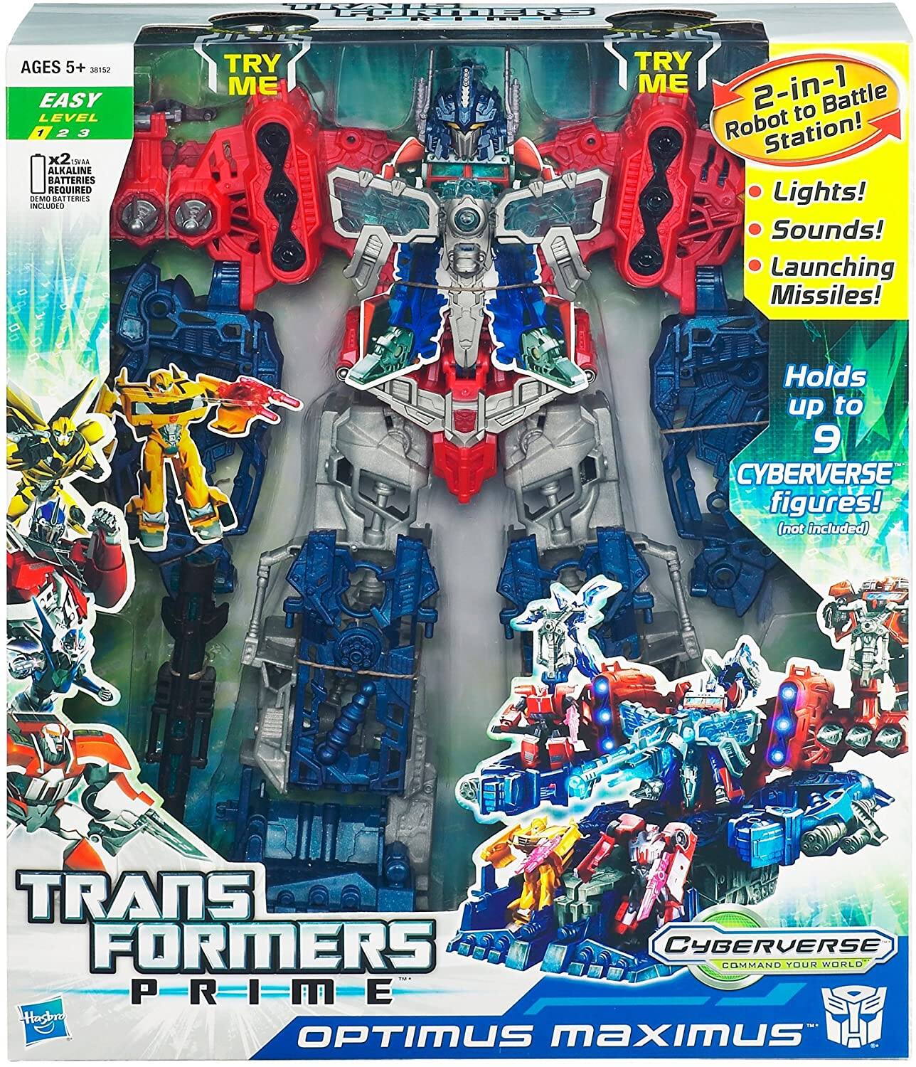 FORMERS  
AGES 5+ 38152 EASY LEVEL 1 2 3 x2 AA NE ALKALINE BATTERIES REQUIRED DEMO BATTERIES INCLUDED  
TRY ME  
TRY ME 2-in-1 to Battle Robot Station! Lights! Sounds! Launching Missiles!  
Holds up to 9 CYBERVERSE figures! (not included)  
TRANSFORMERS CYBERVERSE COMMAND YOUR WORLD P=R=I=M-E- Hasbro OPTIMUS maximus