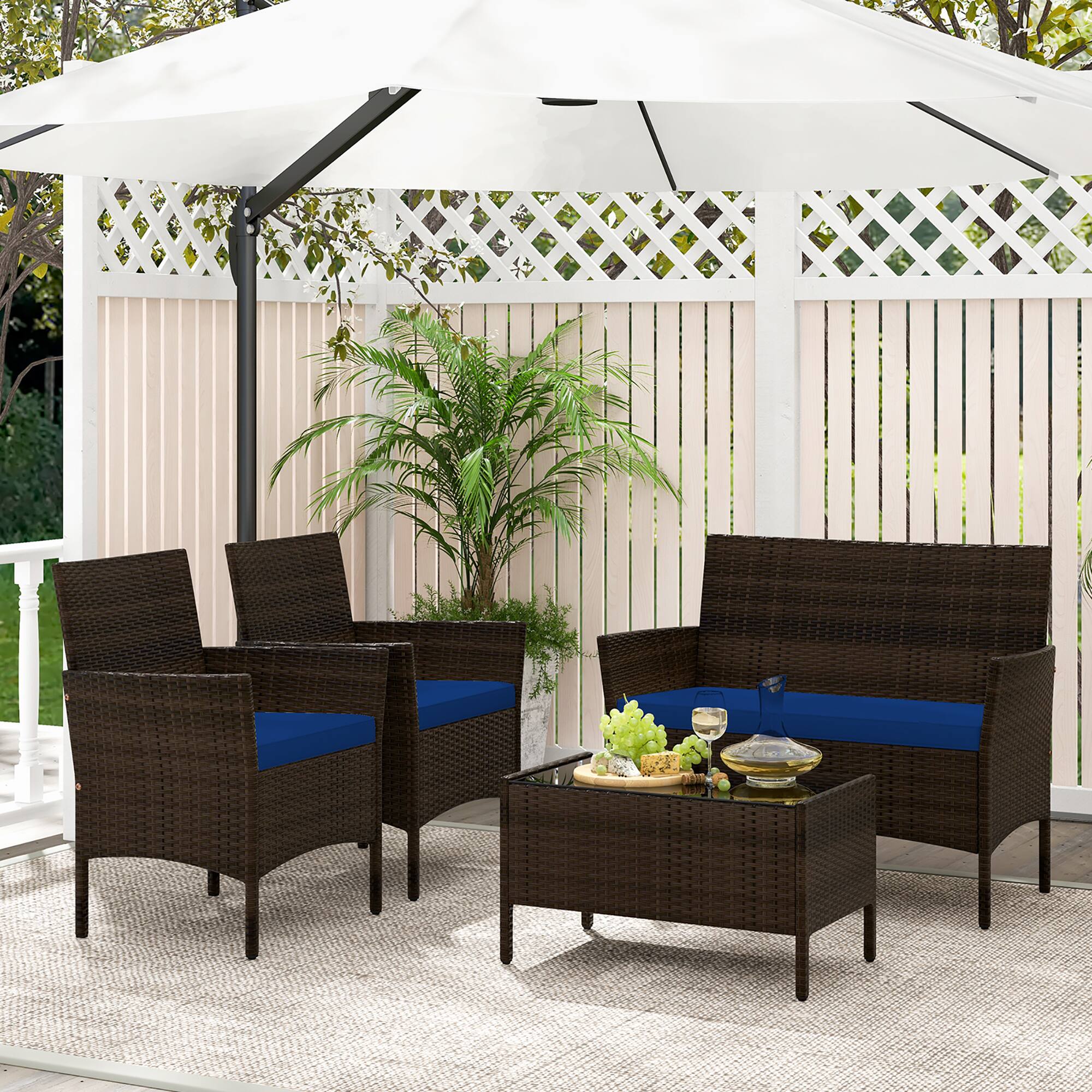 Alt View 3. Gymax - Gymax 4 PCS Patio Rattan Conversation Set Outdoor Wicker Furniture Set w/ Chair & Loveseat - Brown, Navy.