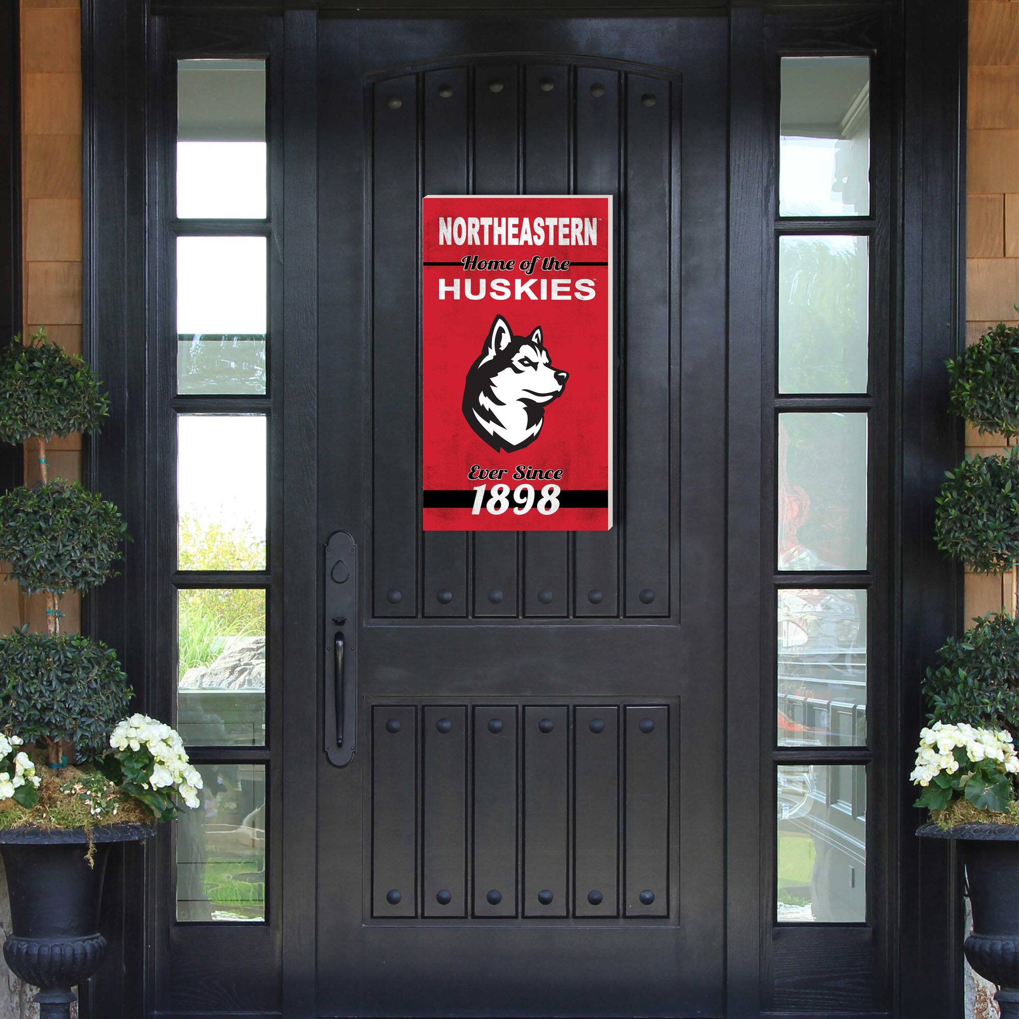 NORTHEASTERN Home of the HUSKIES Ever Since 1898
